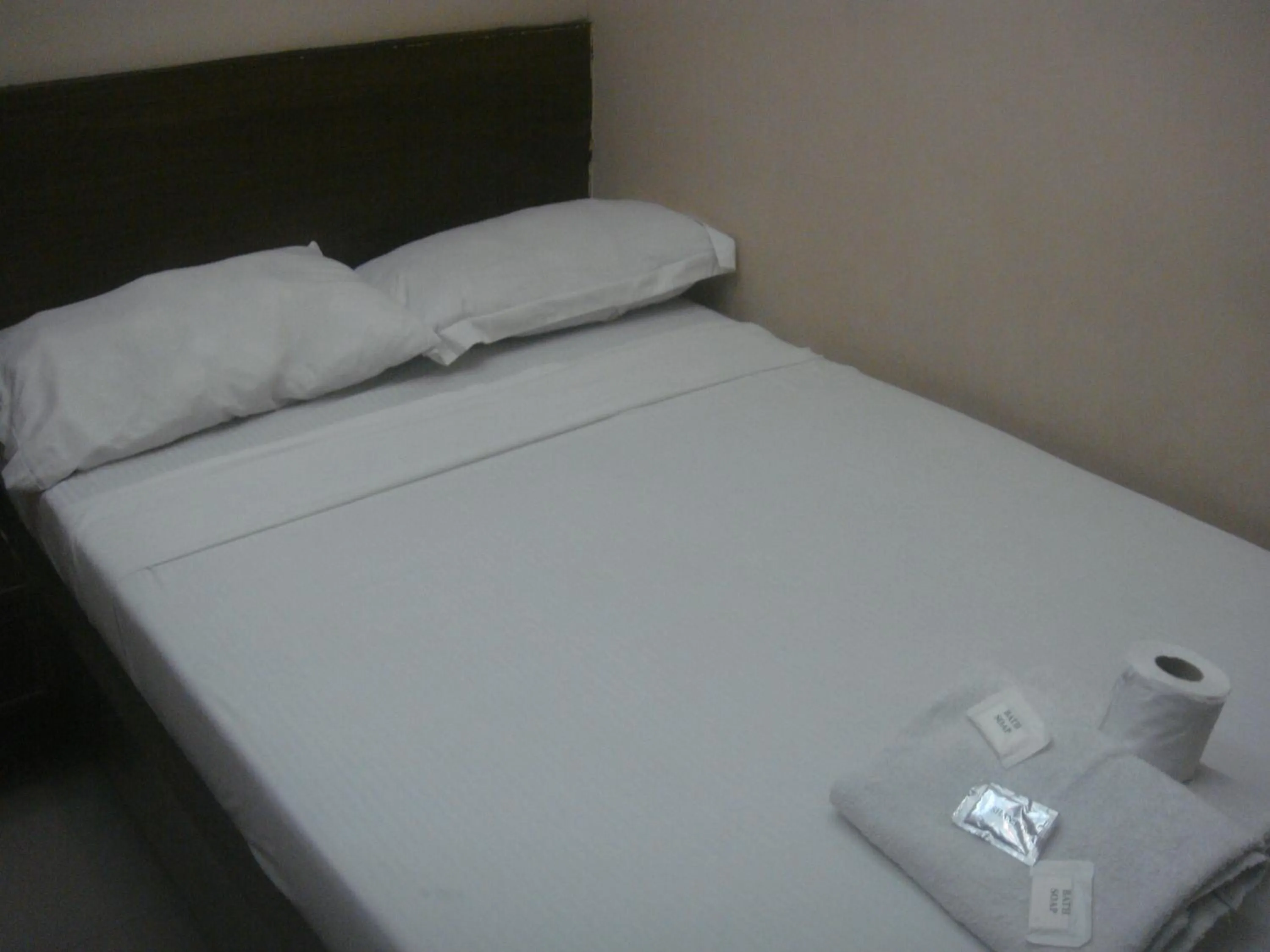Bed in Hidden Pearl Hotel (Janus Luxury Suites)