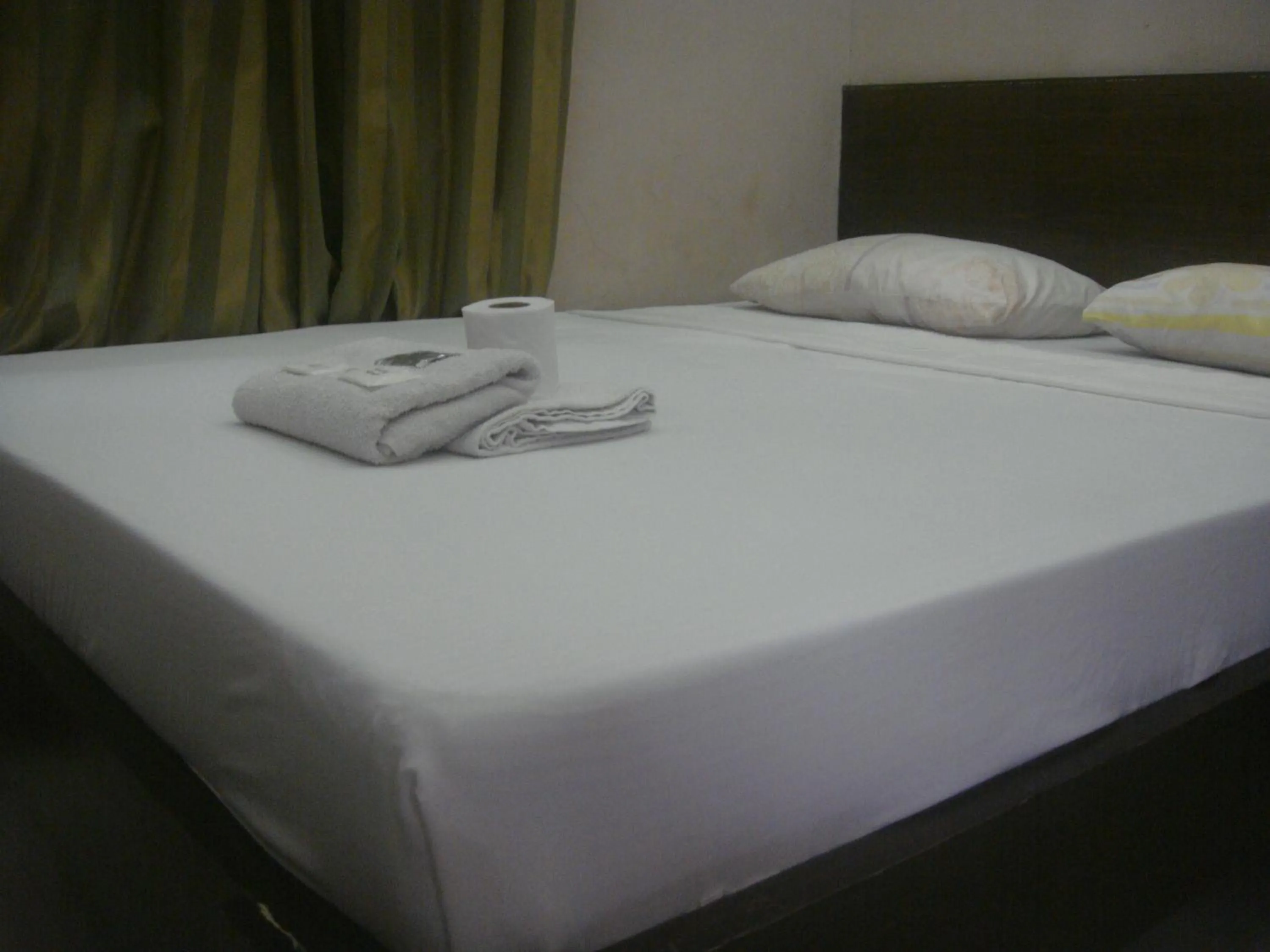 Bed in Hidden Pearl Hotel (Janus Luxury Suites)