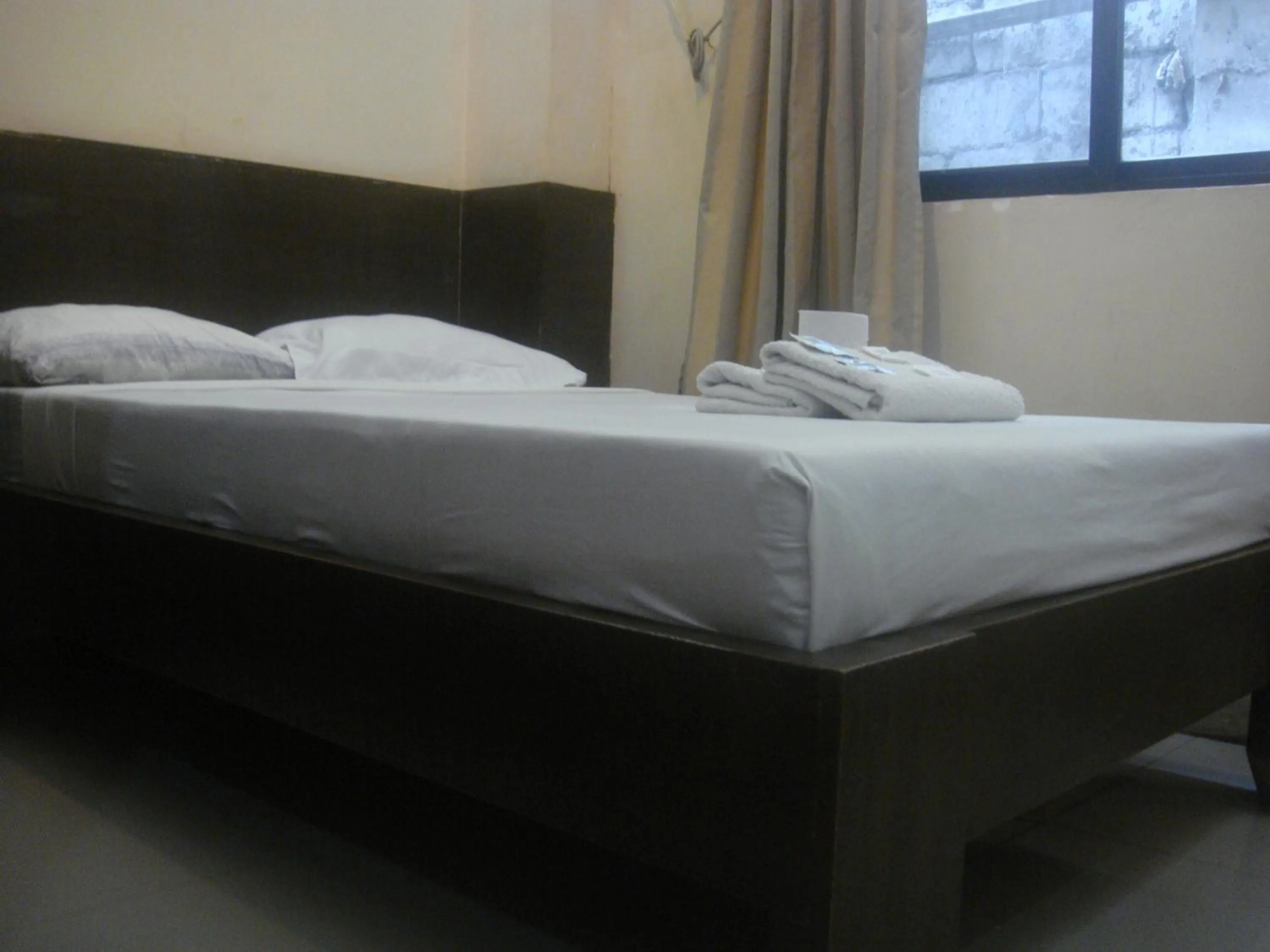 Bed in Hidden Pearl Hotel (Janus Luxury Suites)