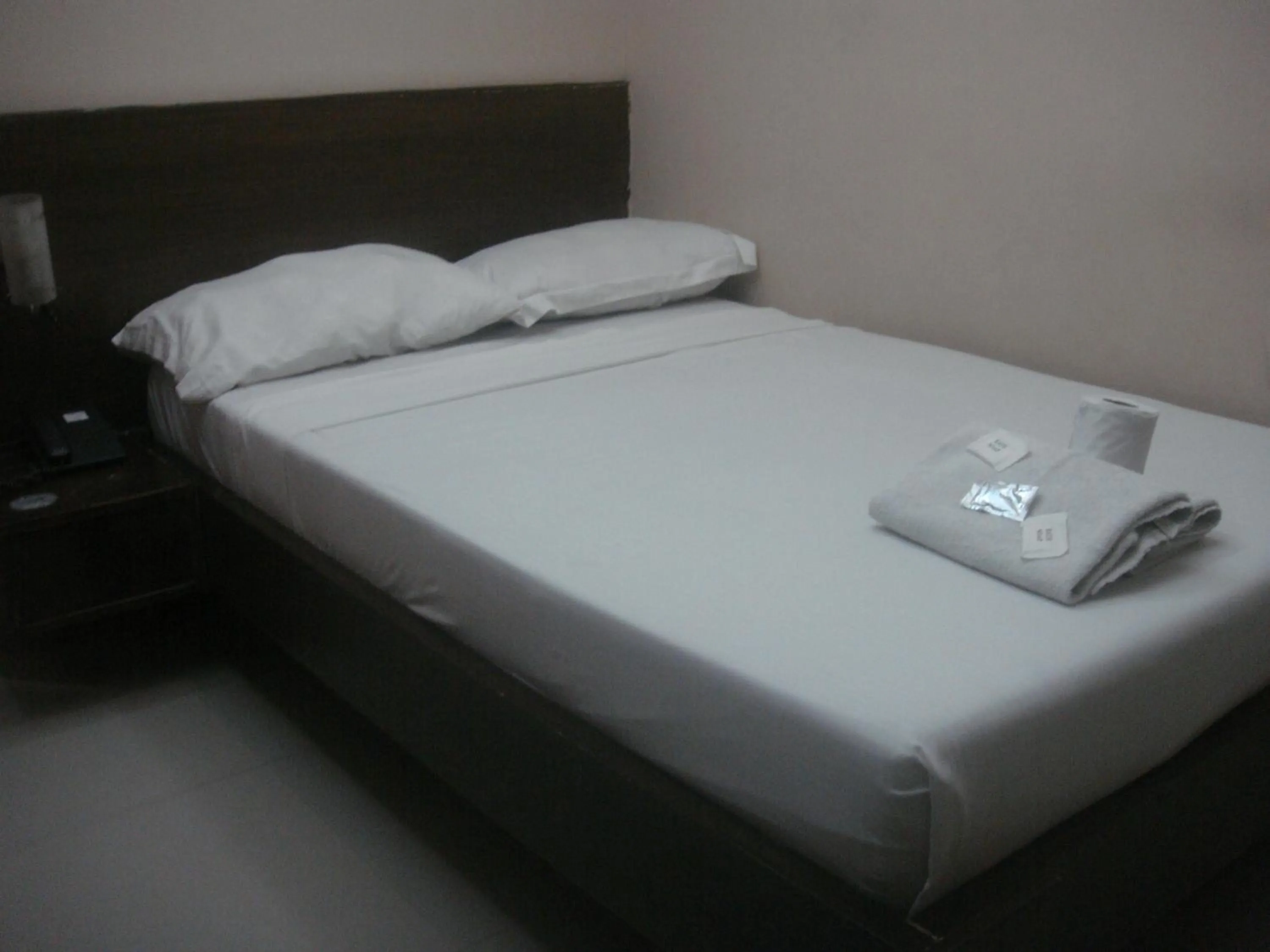 Bed in Hidden Pearl Hotel (Janus Luxury Suites)