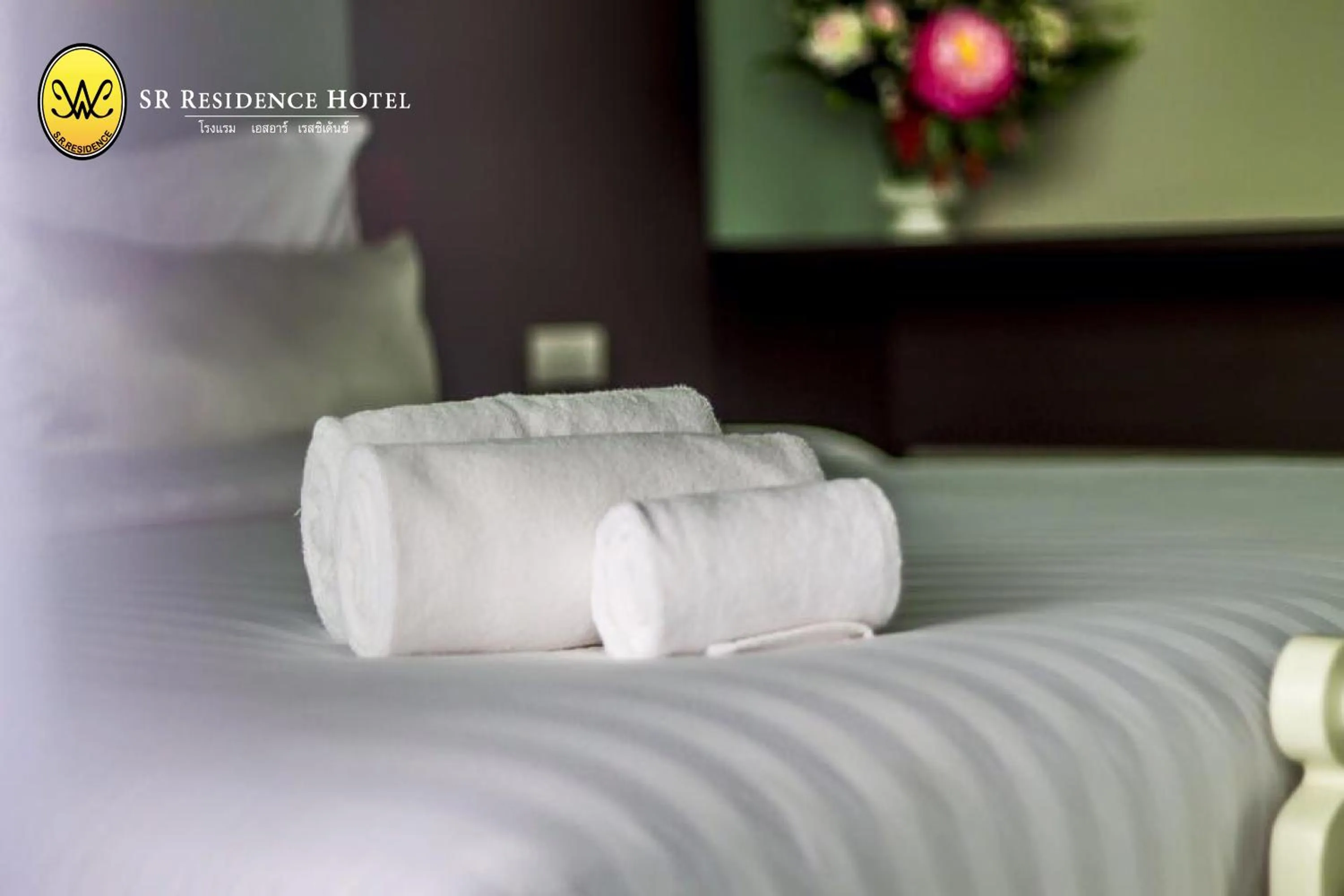 Bed in SR Residence Hotel