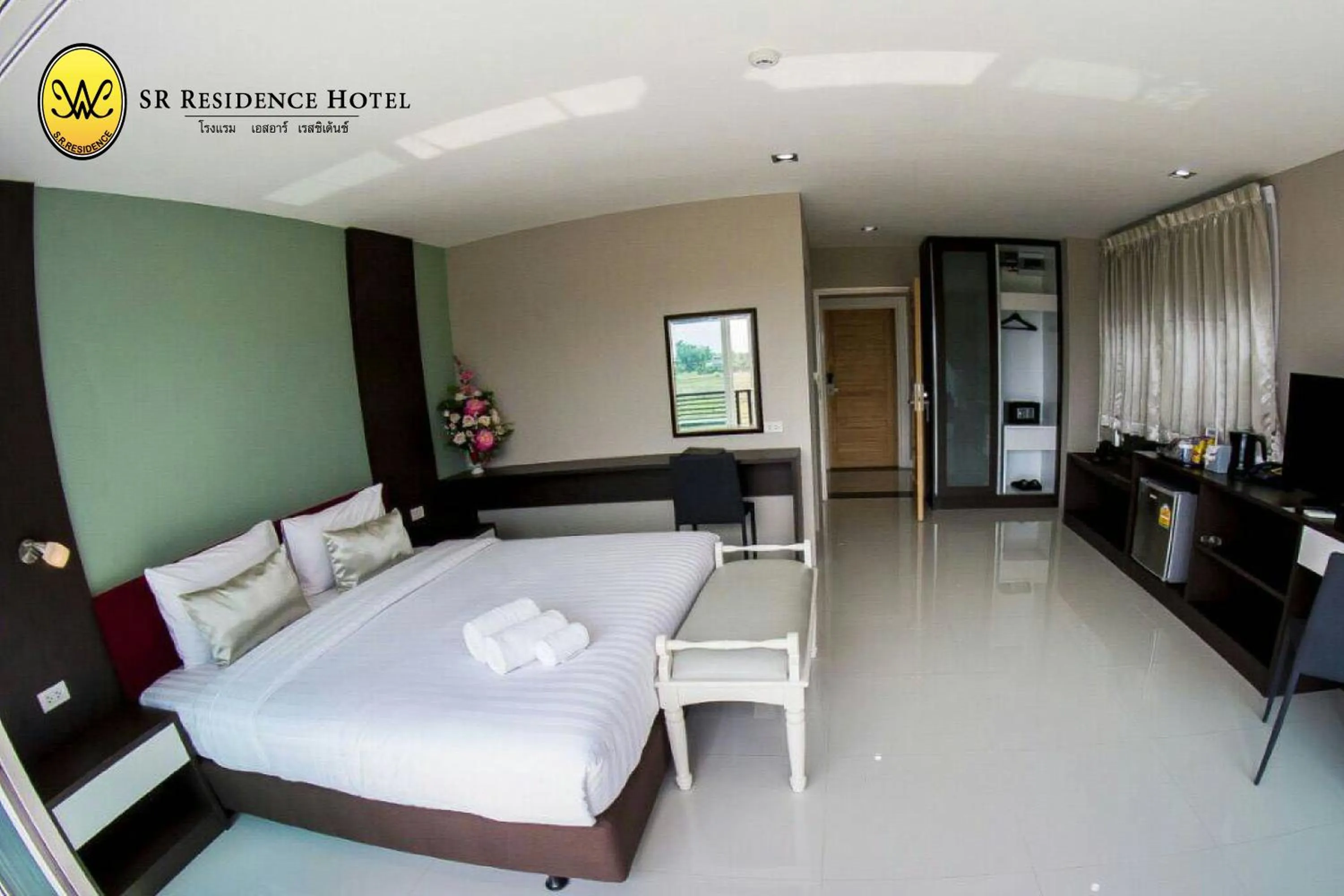 Photo of the whole room, Bed in SR Residence Hotel