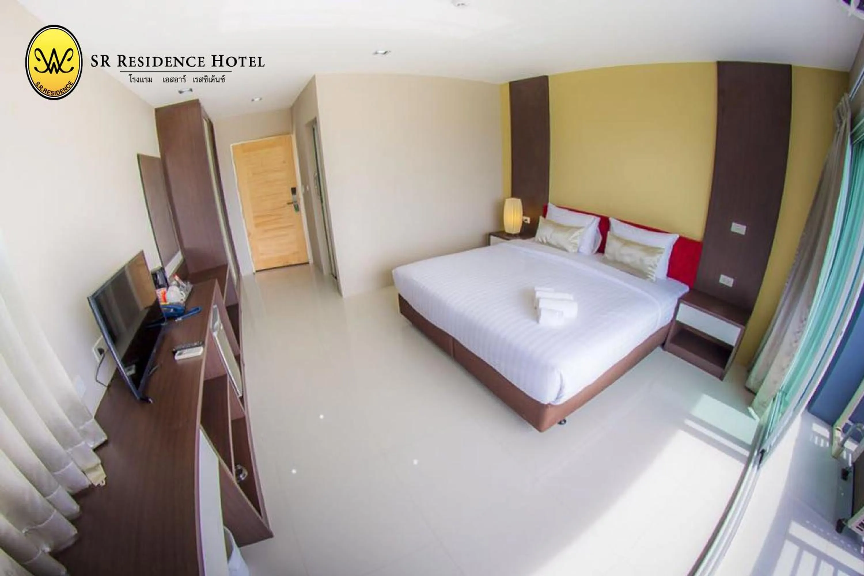 Bed in SR Residence Hotel