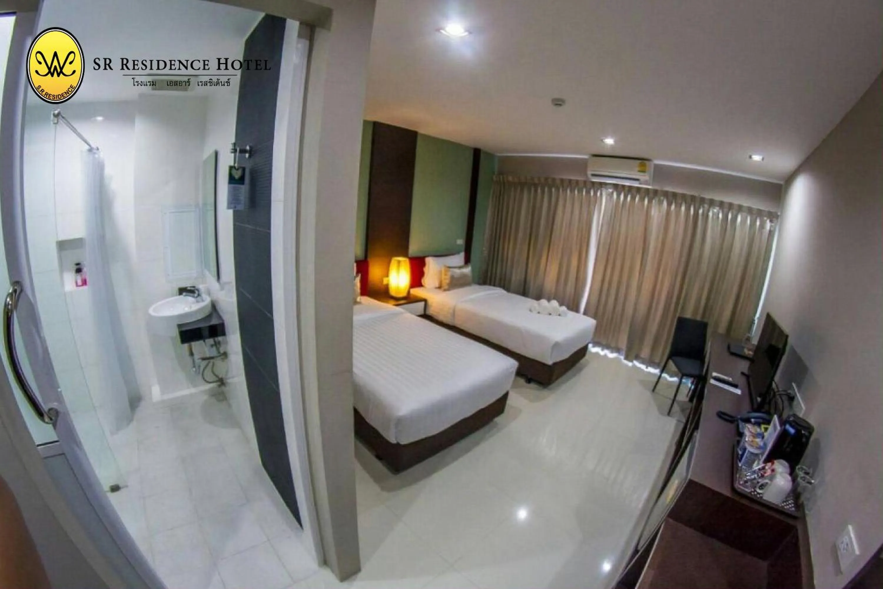 Photo of the whole room, Bed in SR Residence Hotel