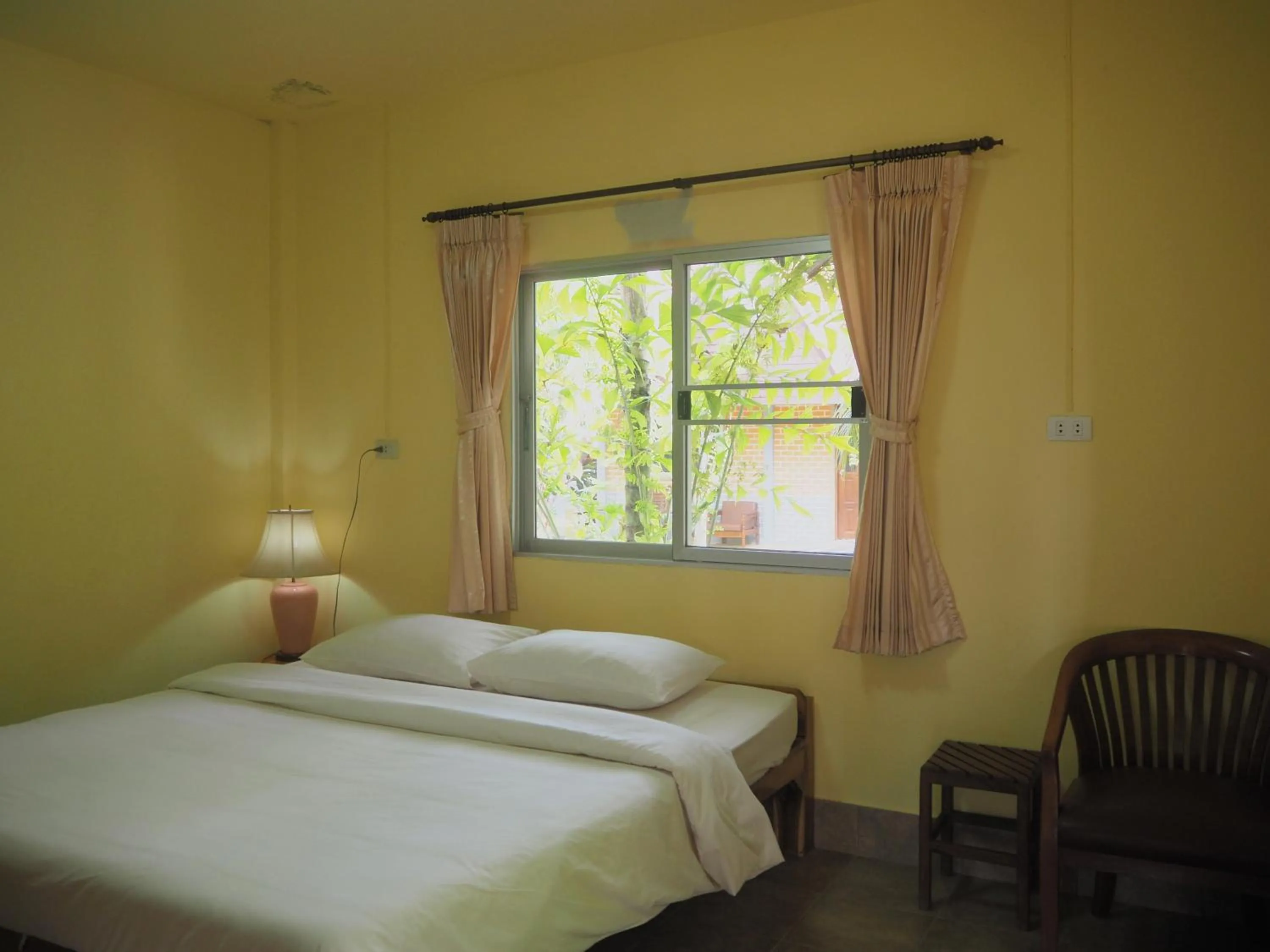 Bed in Coconut Bungalow