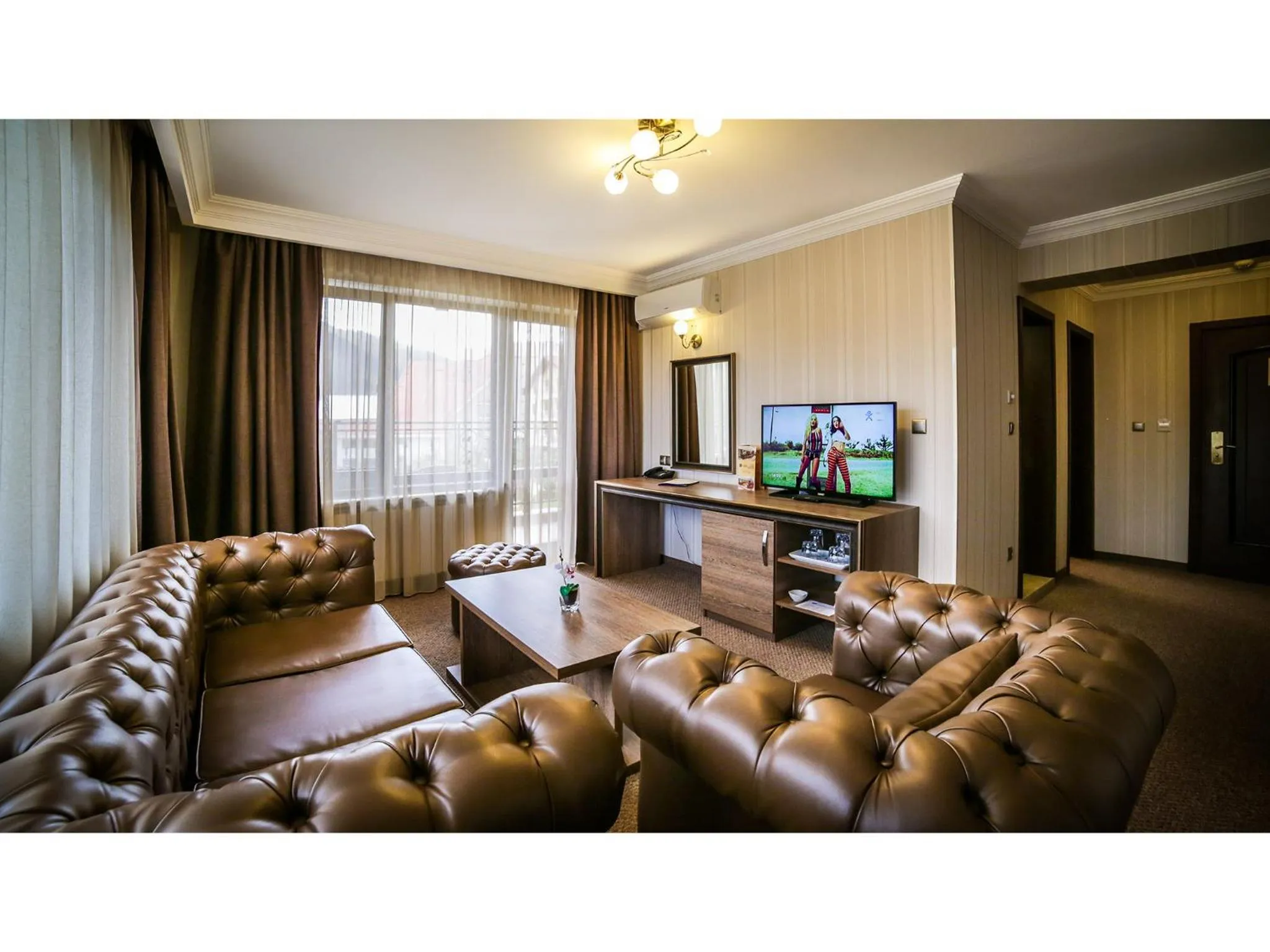 Communal lounge/ TV room in Park Hotel and SPA Vella Hills