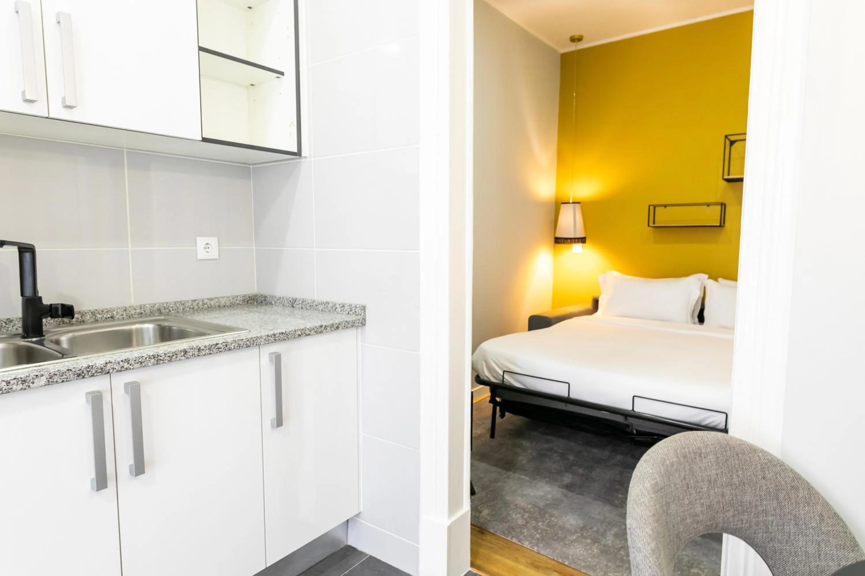 Bedroom, Bed in Lisboa 85 Suites & Apartments by RIDAN Hotels