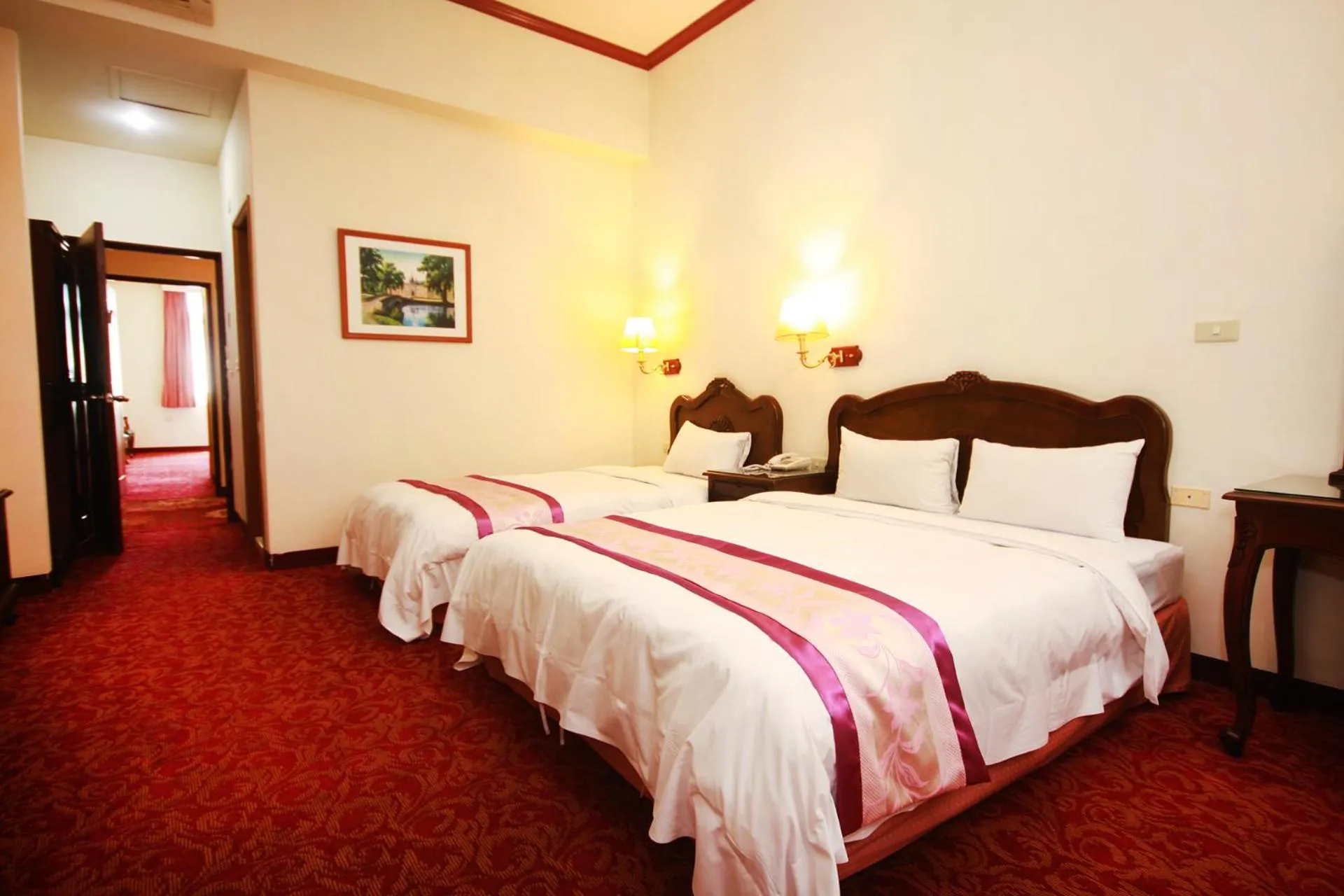 Bed in East Commercial Affairs Hotel
