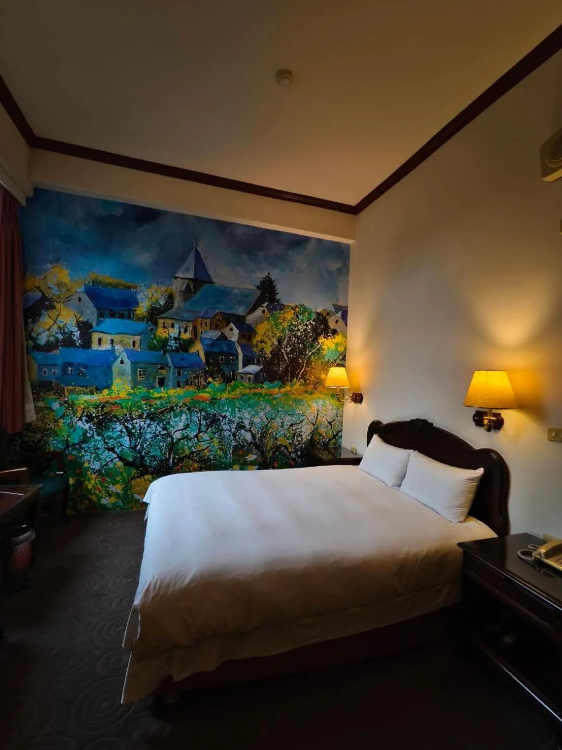 Bed in East Commercial Affairs Hotel