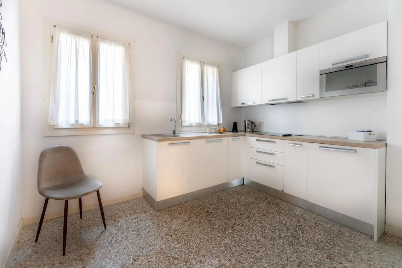 kitchen in San Teodoro Palace - Luxury Apartments