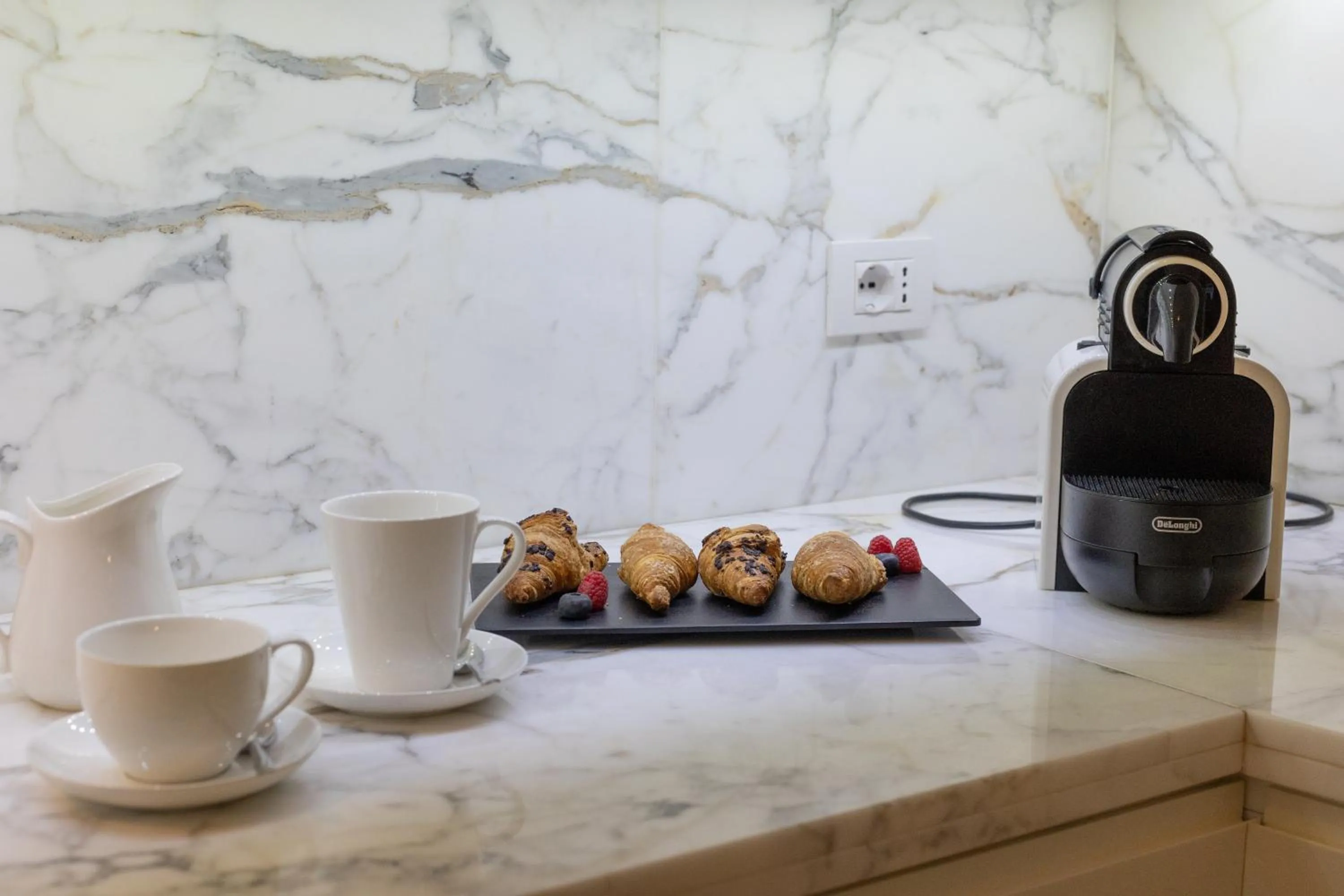 Kitchen or kitchenette in San Teodoro Palace - Luxury Apartments