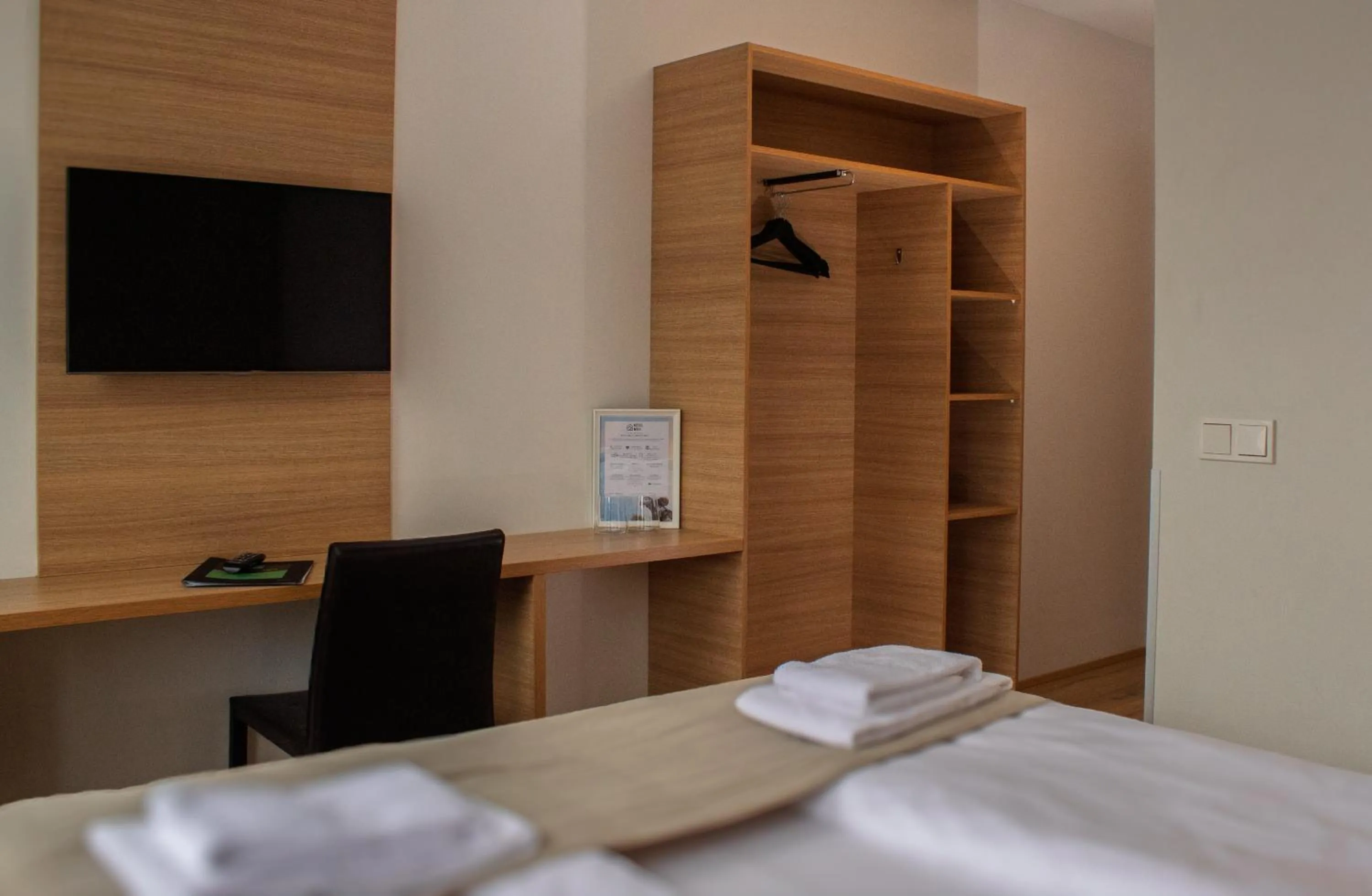 TV and multimedia, Bed in Hotel Muli