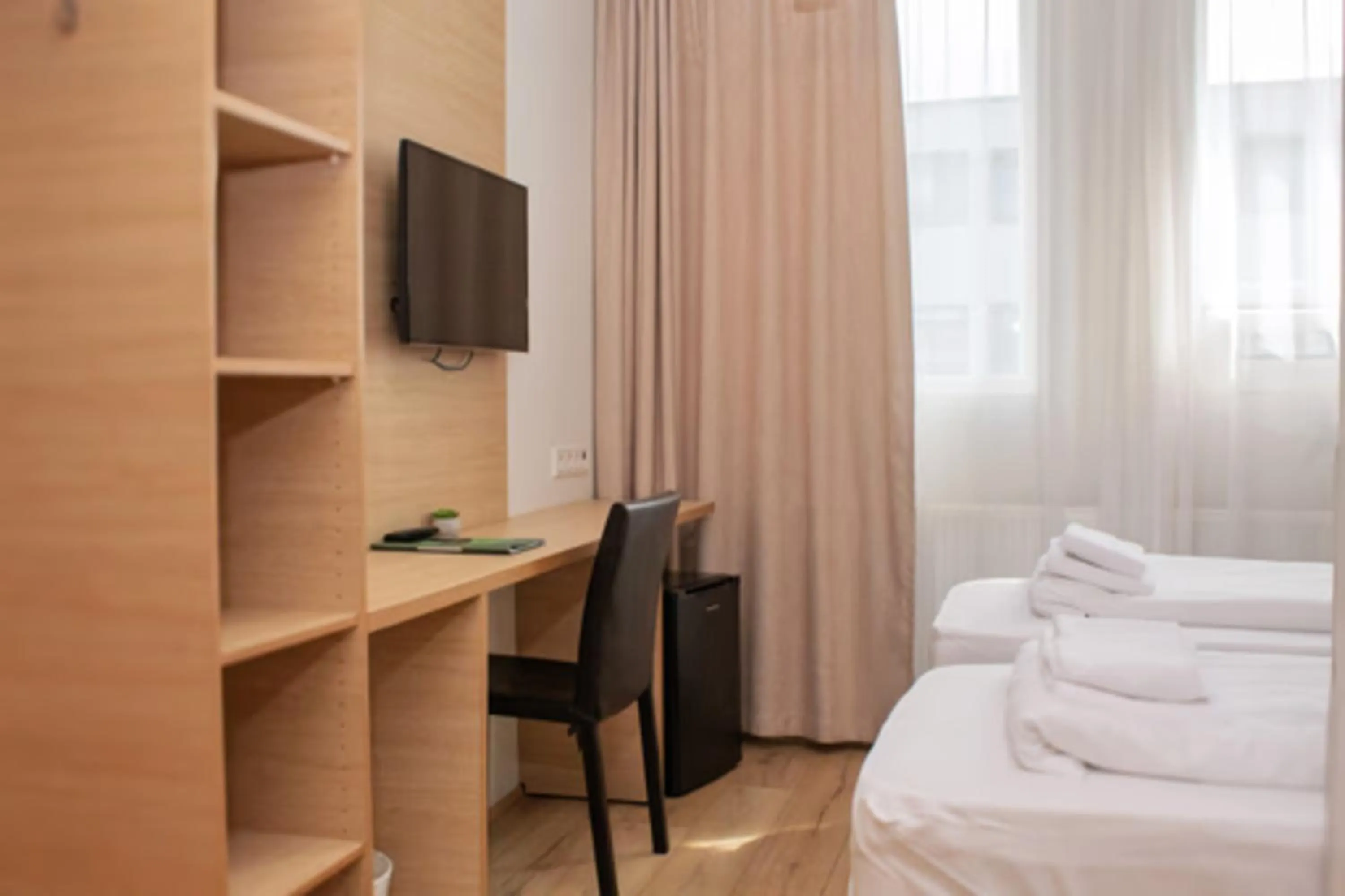 TV and multimedia, Bed in Hotel Muli