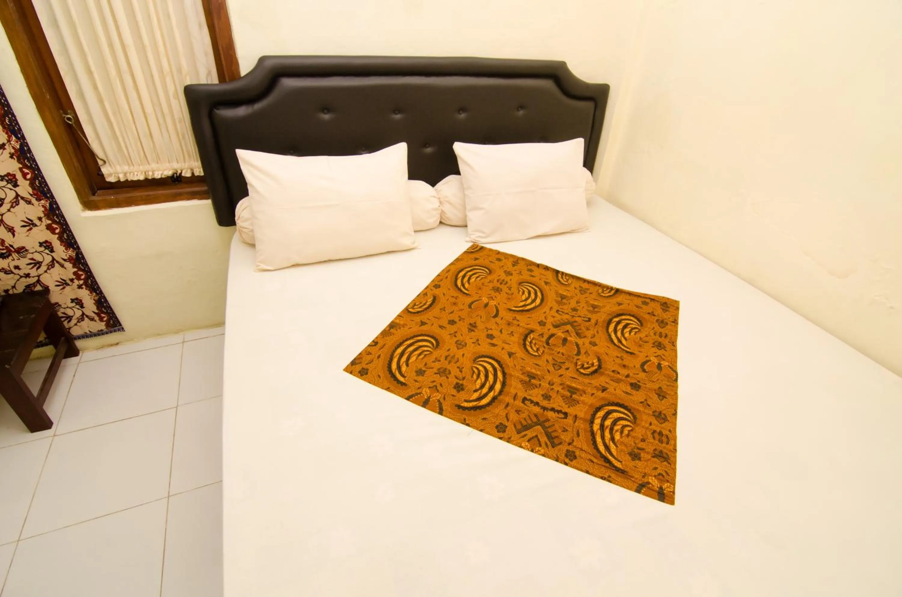 Photo of the whole room, Bed in Pendopo Andari Homestay