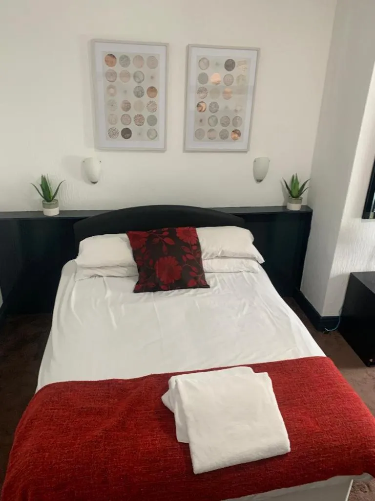 Bed in Trinity Guest House