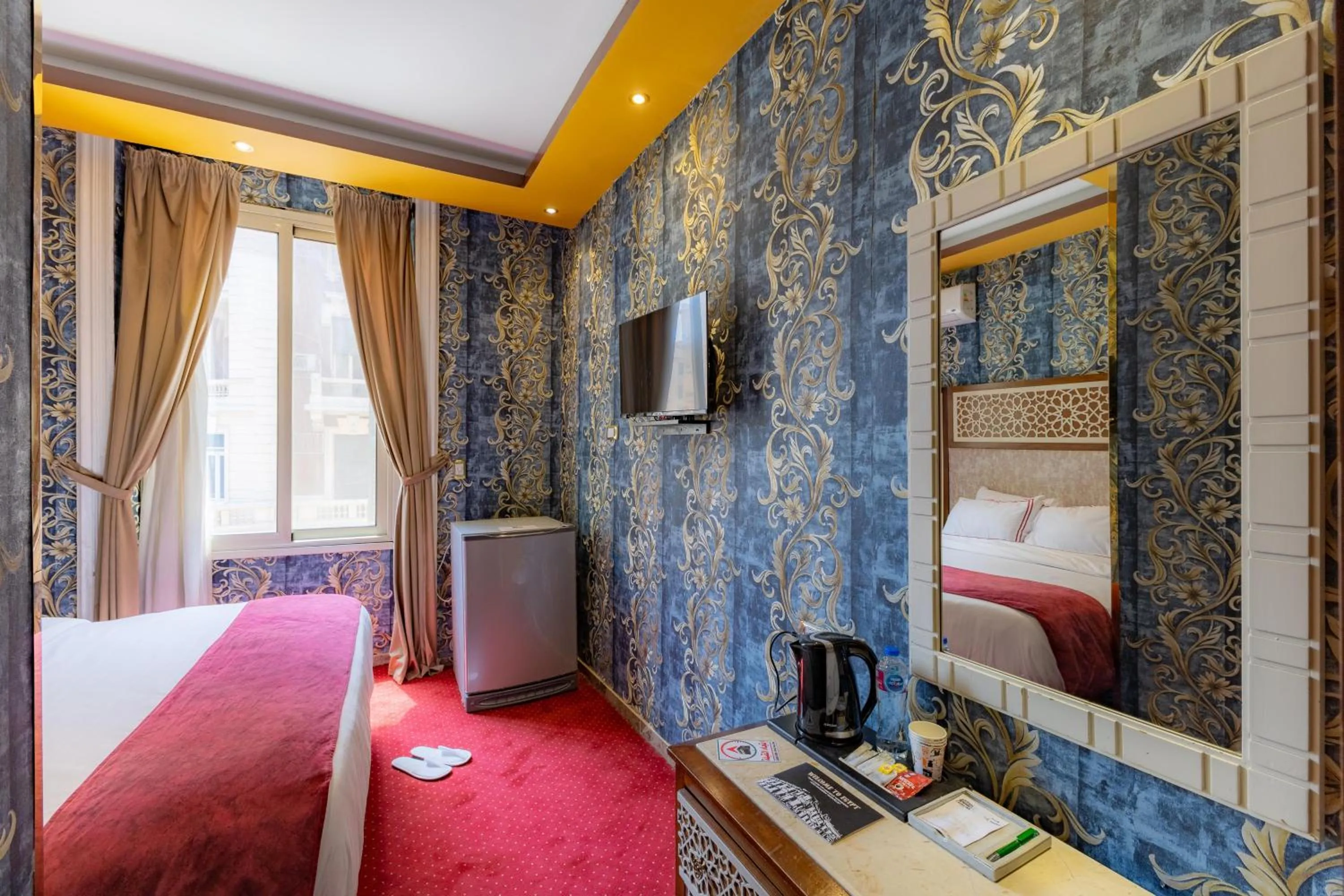 Photo of the whole room, Bed in Cairo Inn