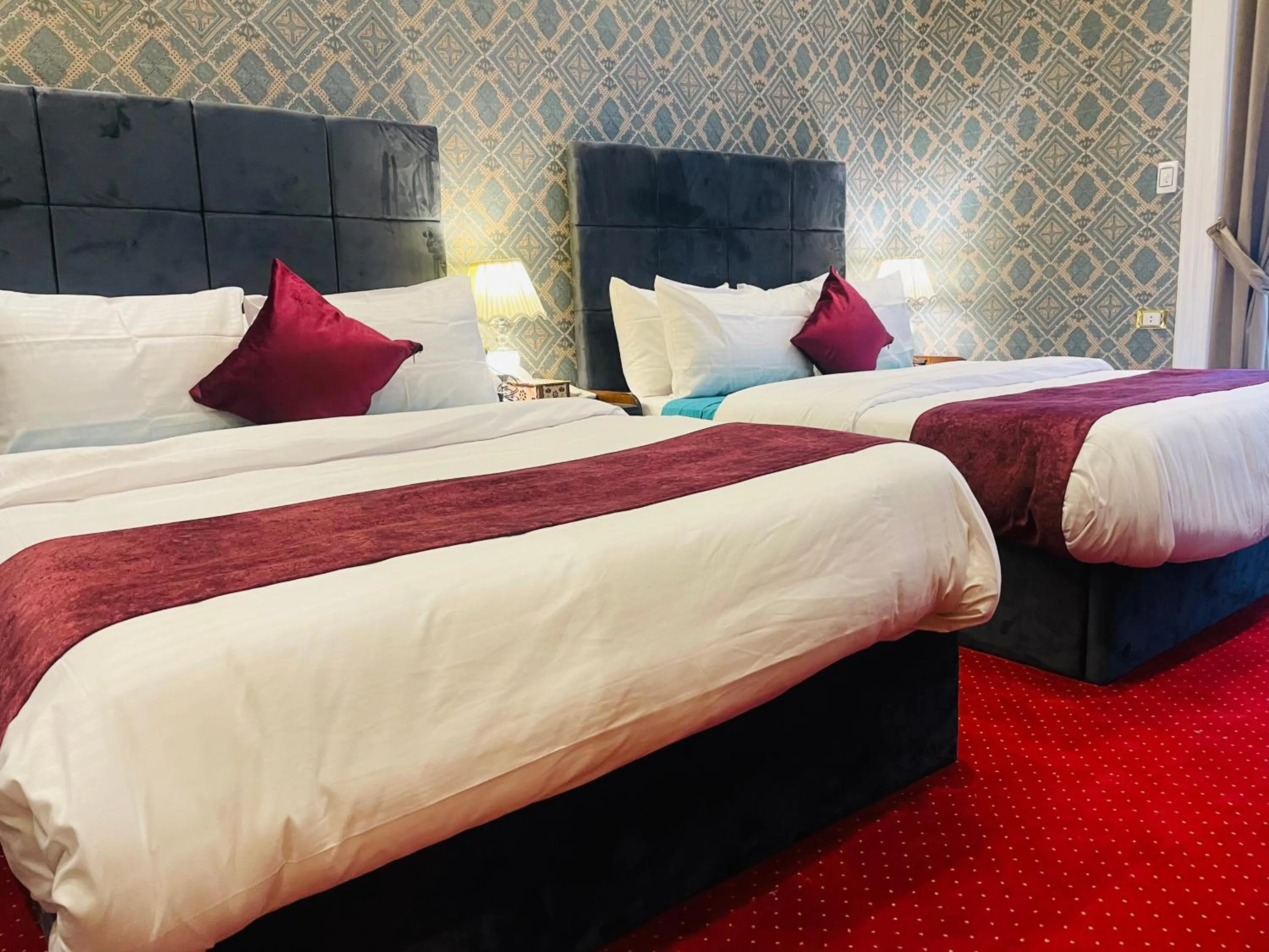 Photo of the whole room, Bed in Cairo Inn