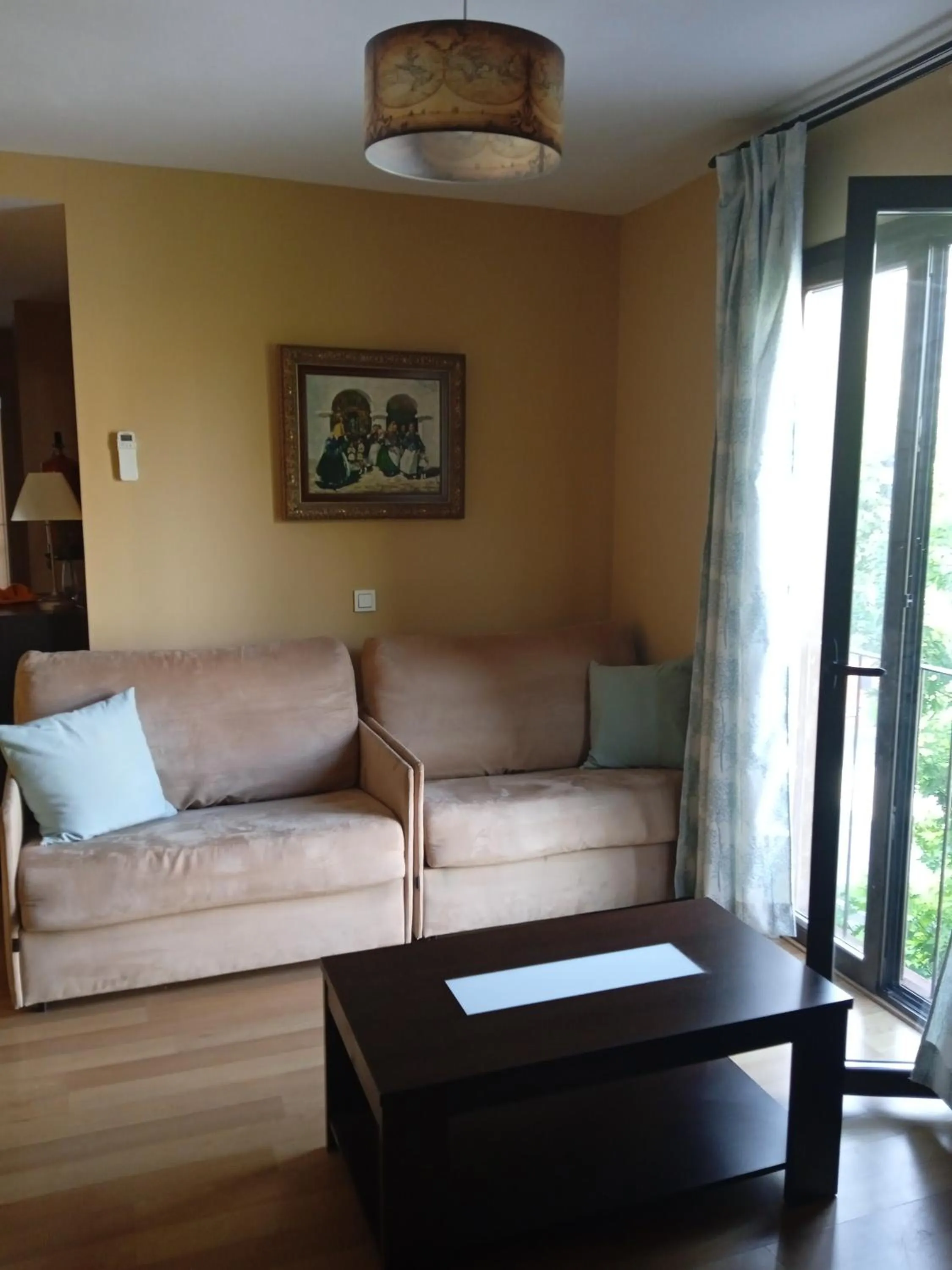 Communal lounge/ TV room in Apartamentos Turísticos La Garza