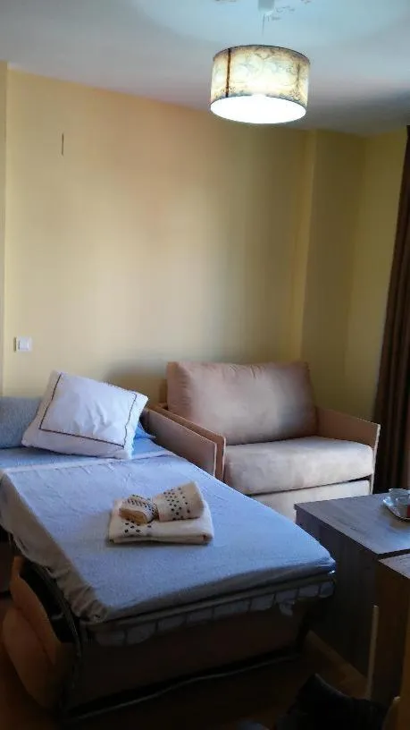 Bed in Apartamentos Turísticos La Garza