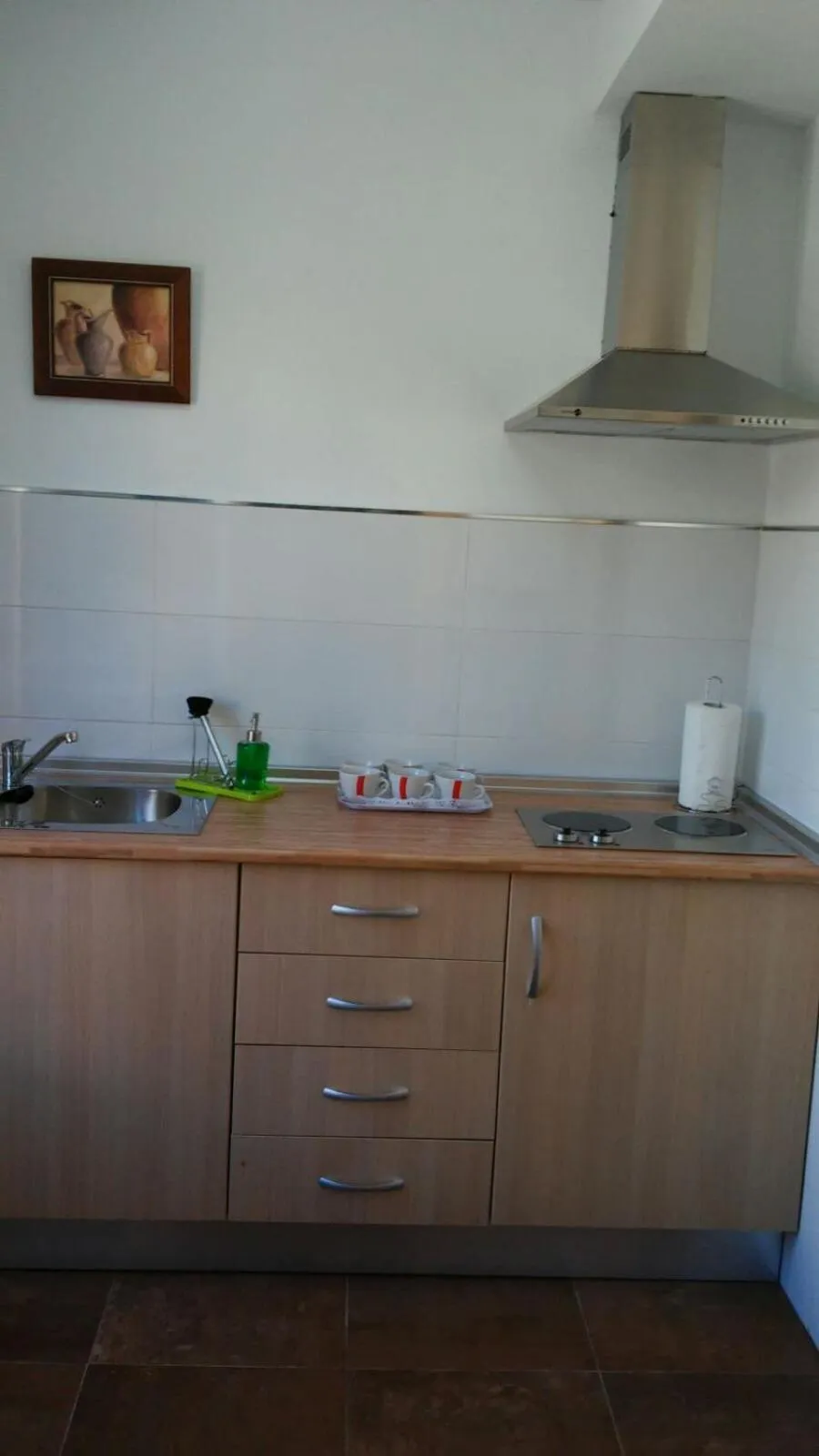 Kitchen or kitchenette in Apartamentos Turísticos La Garza