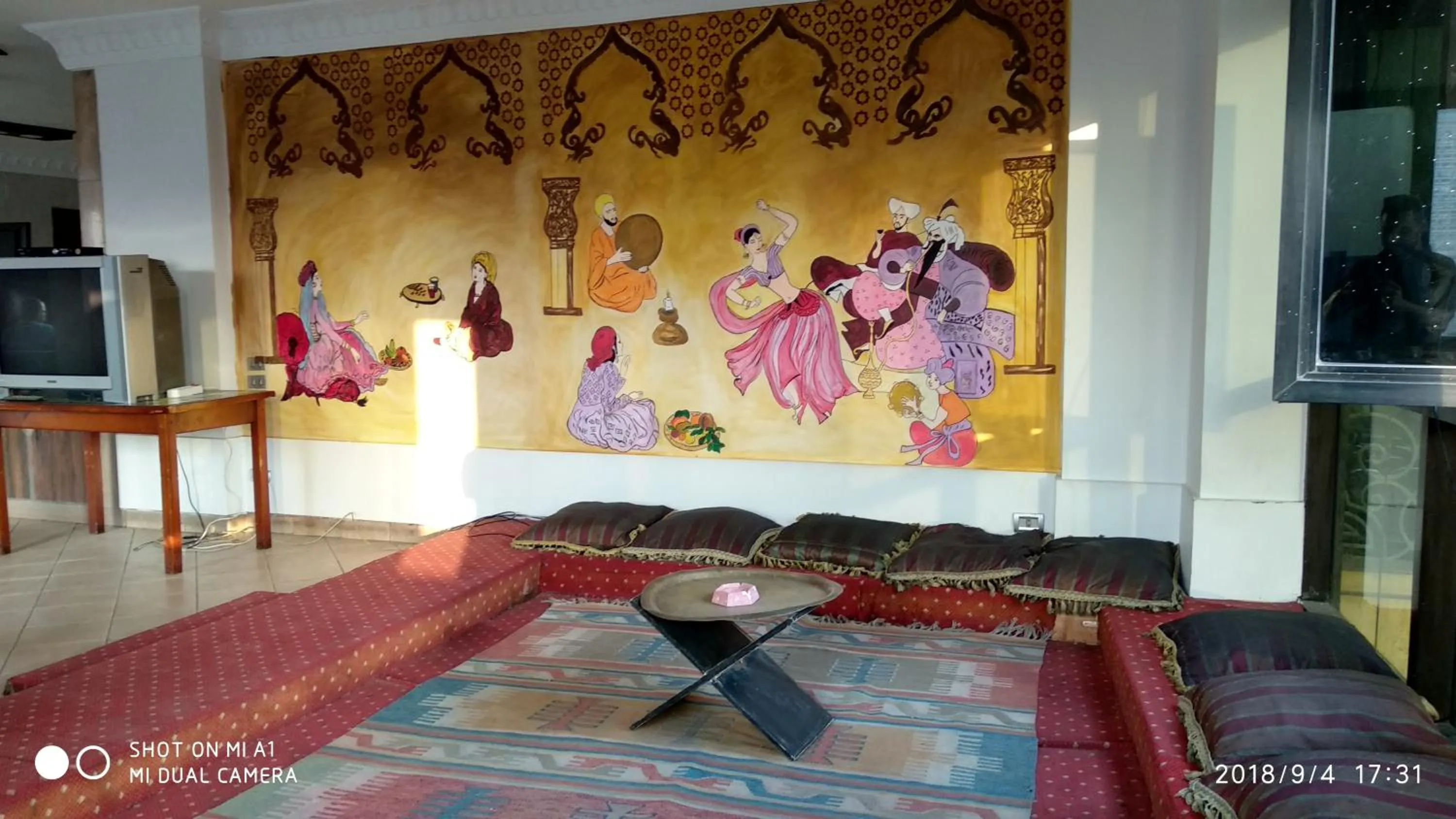 Communal lounge/ TV room in Arabesque Hotel