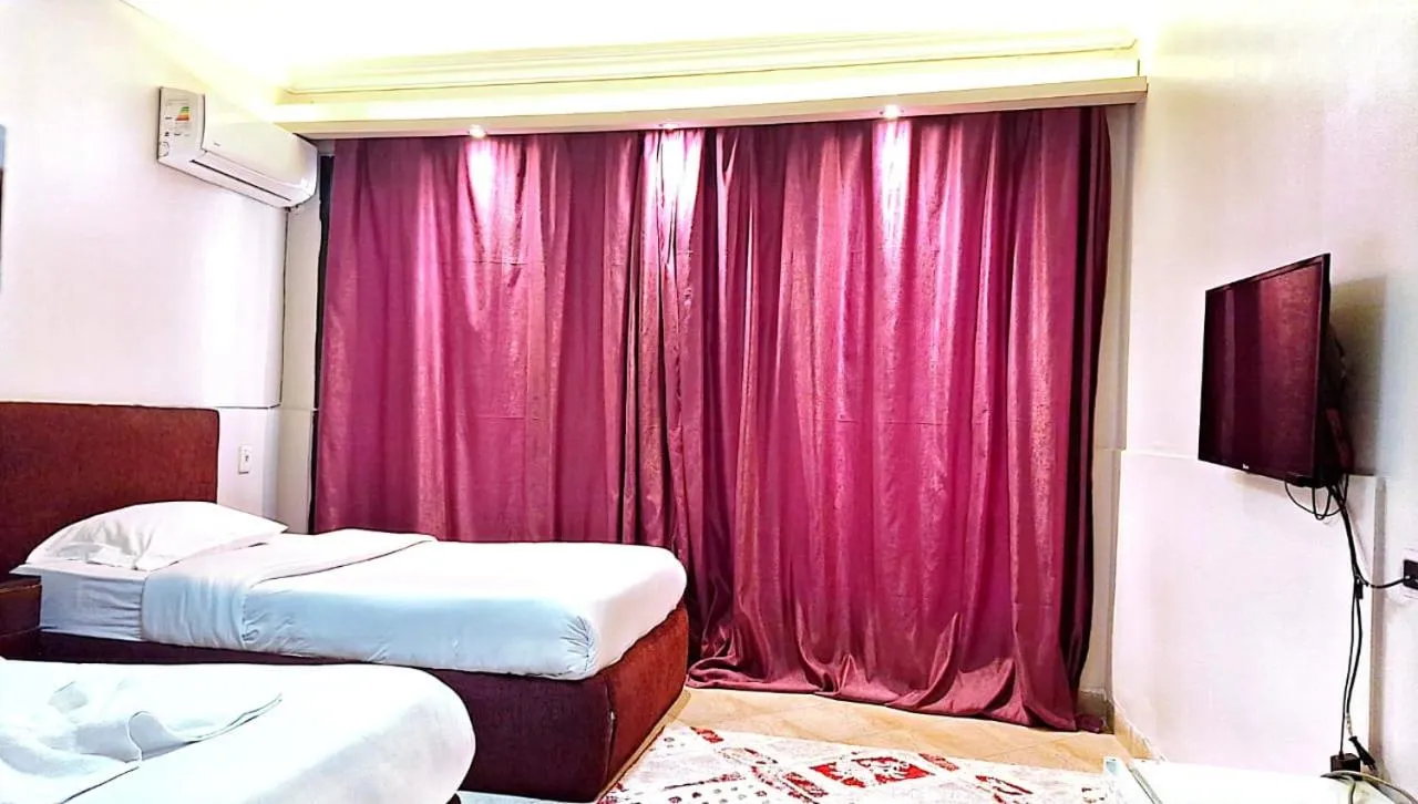 Bed in Arabesque Hotel