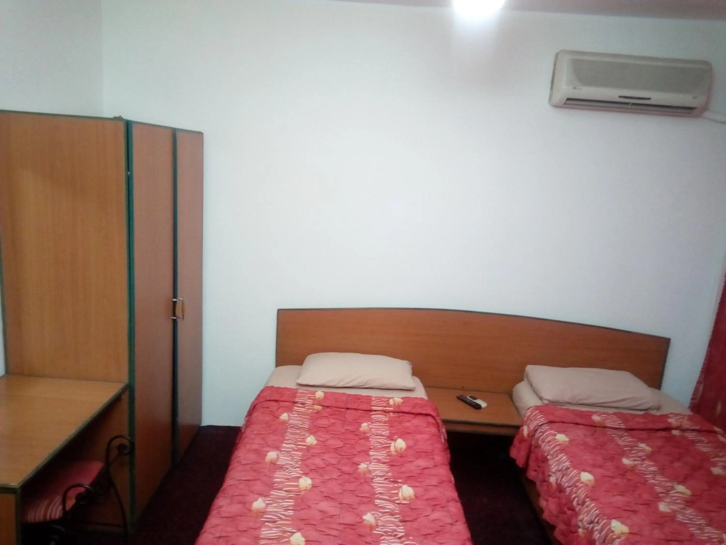 Bed in Arabesque Hotel