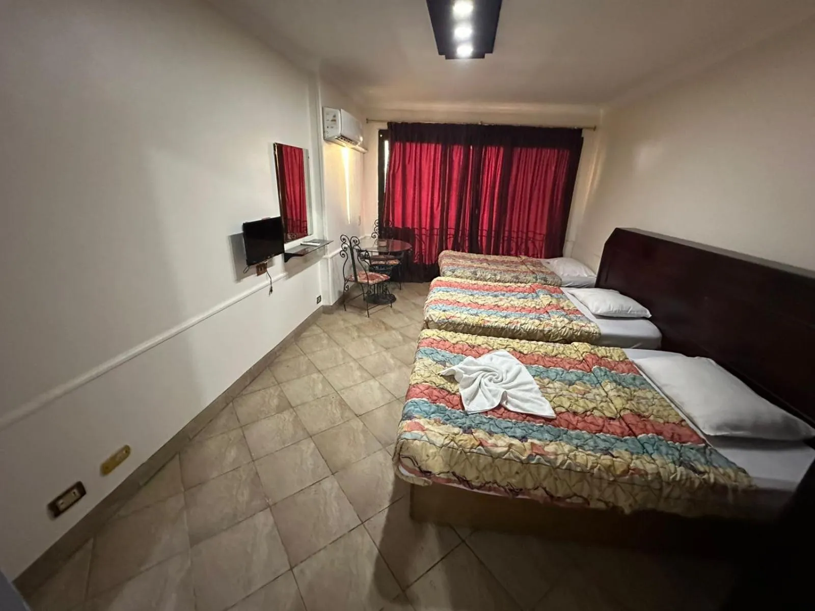 Bed in Arabesque Hotel