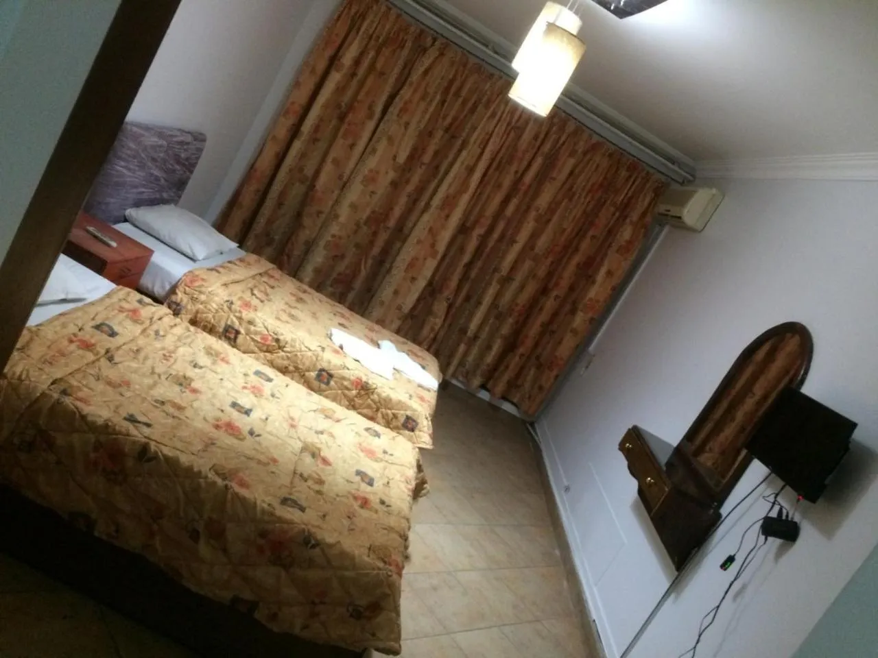 Bed in Arabesque Hotel