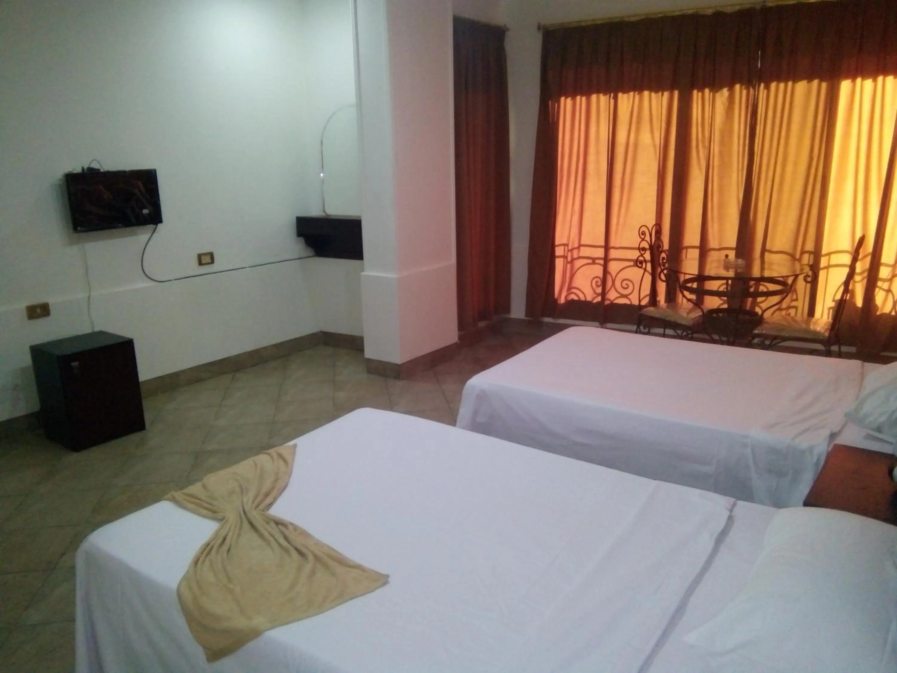 Bed in Arabesque Hotel