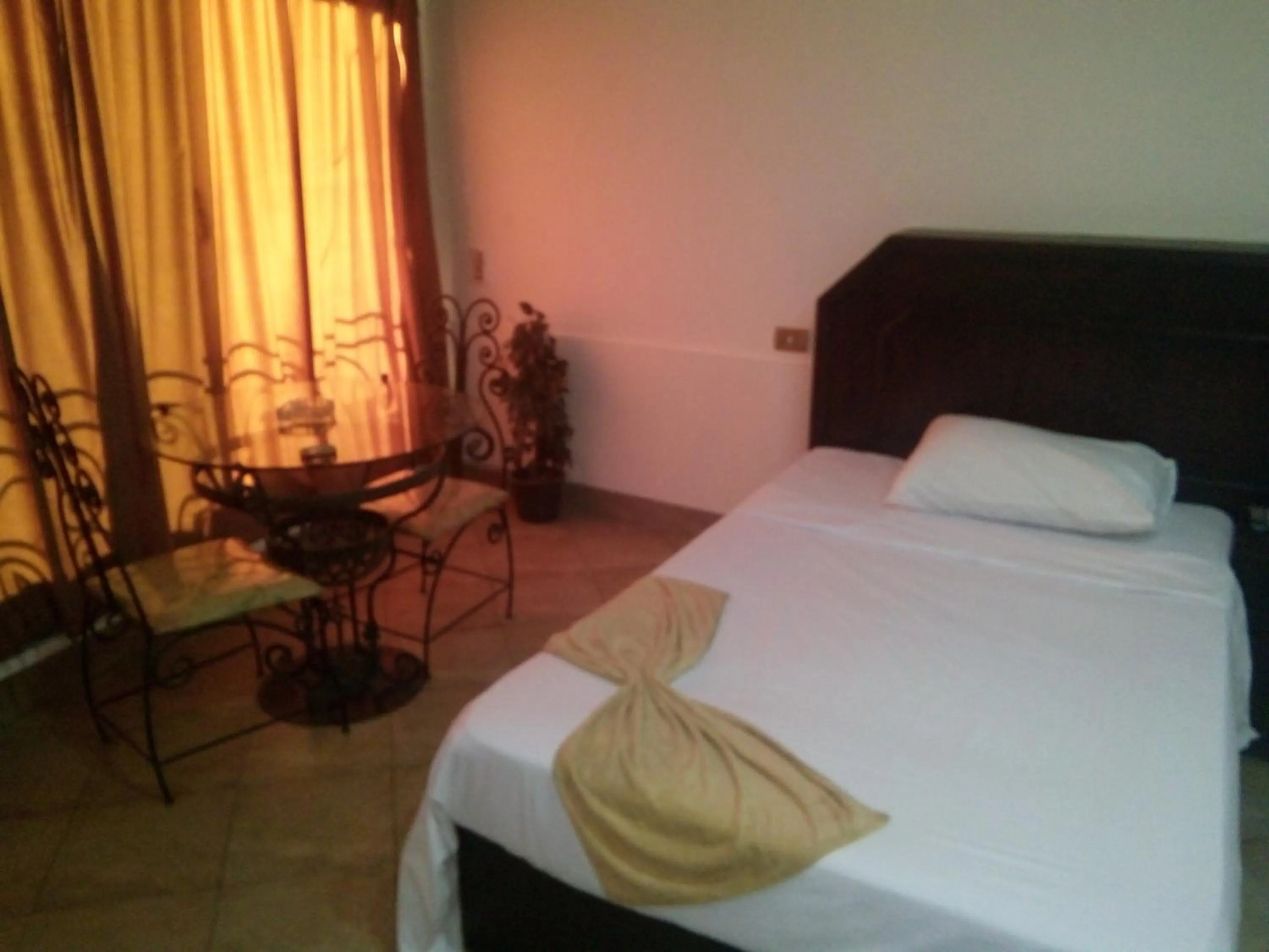 Bed in Arabesque Hotel