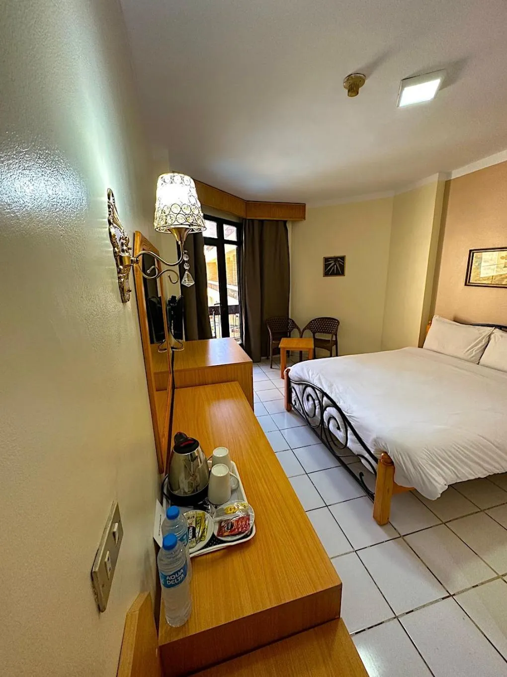 Bed in Gaddis Hotel, Suites and Apartments