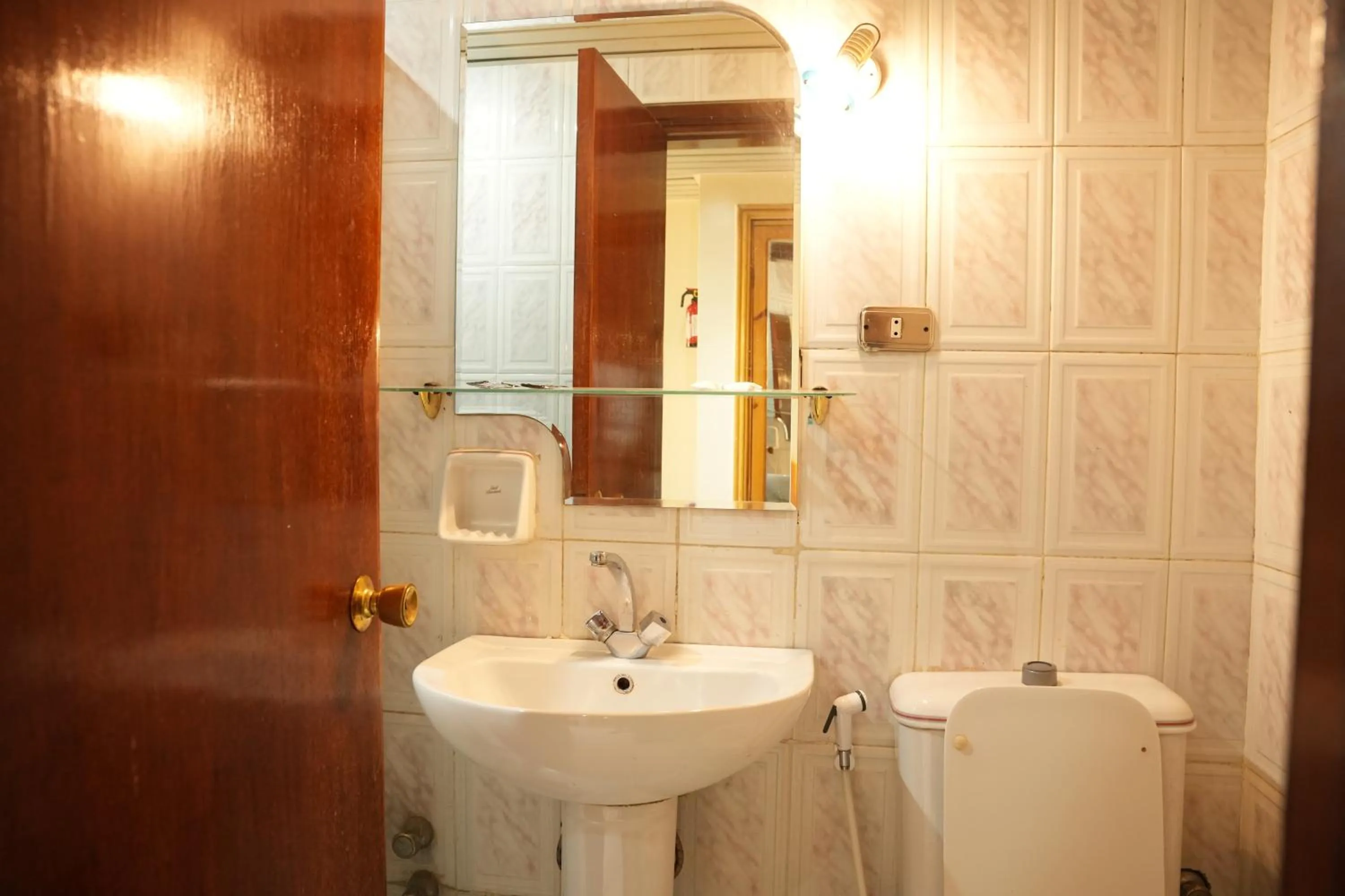 Bathroom in Gaddis Hotel, Suites and Apartments
