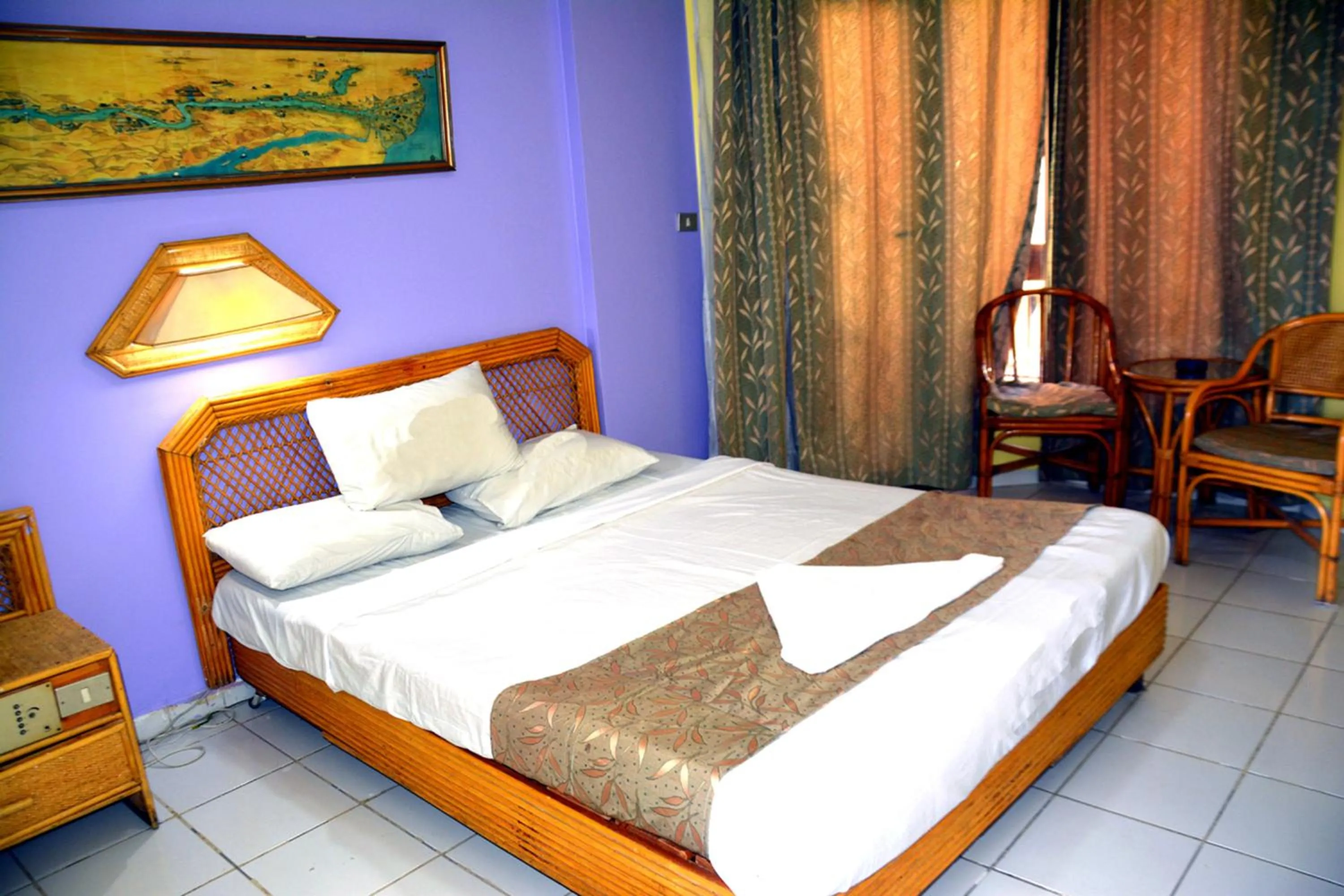Bed in Gaddis Hotel, Suites and Apartments