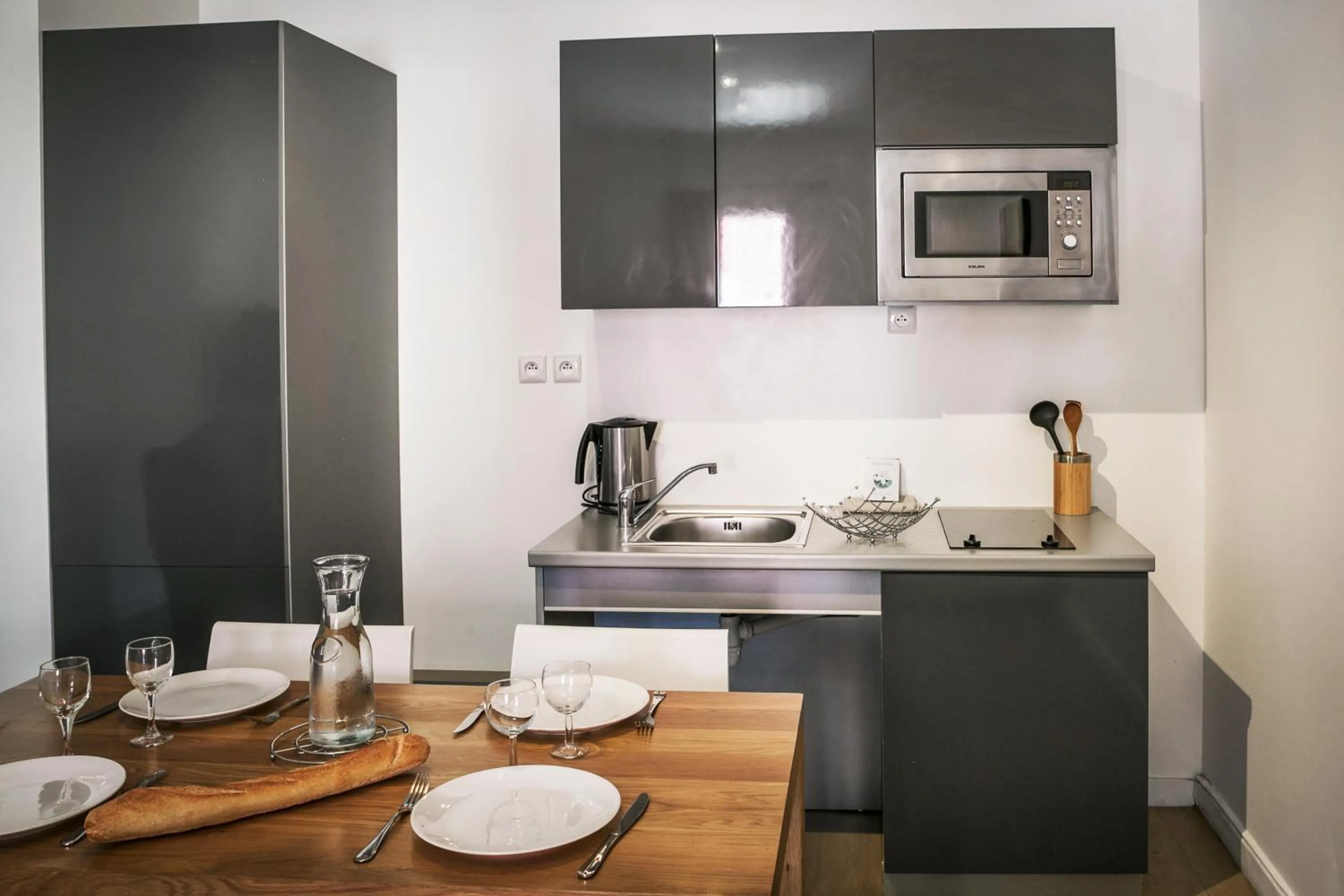 Kitchen or kitchenette in Comfort Aparthotel Lourdes Lorda