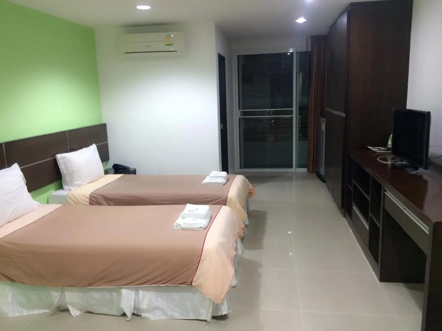 Bed in Diamond Bangkok Apartment