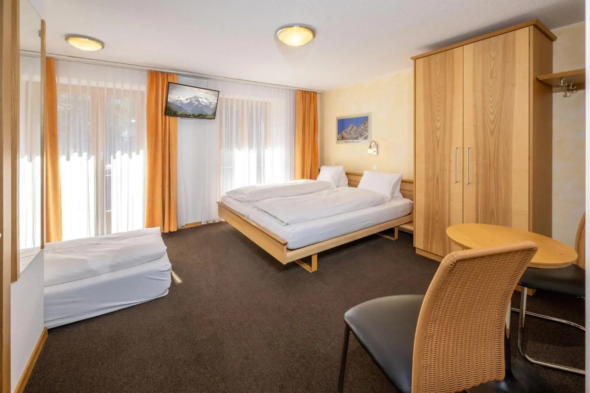 Comfort Triple Room in Aktiv Hotel & Spa Hannigalp Comfort Triple Room in Aktiv Hotel & Spa Hannigalp