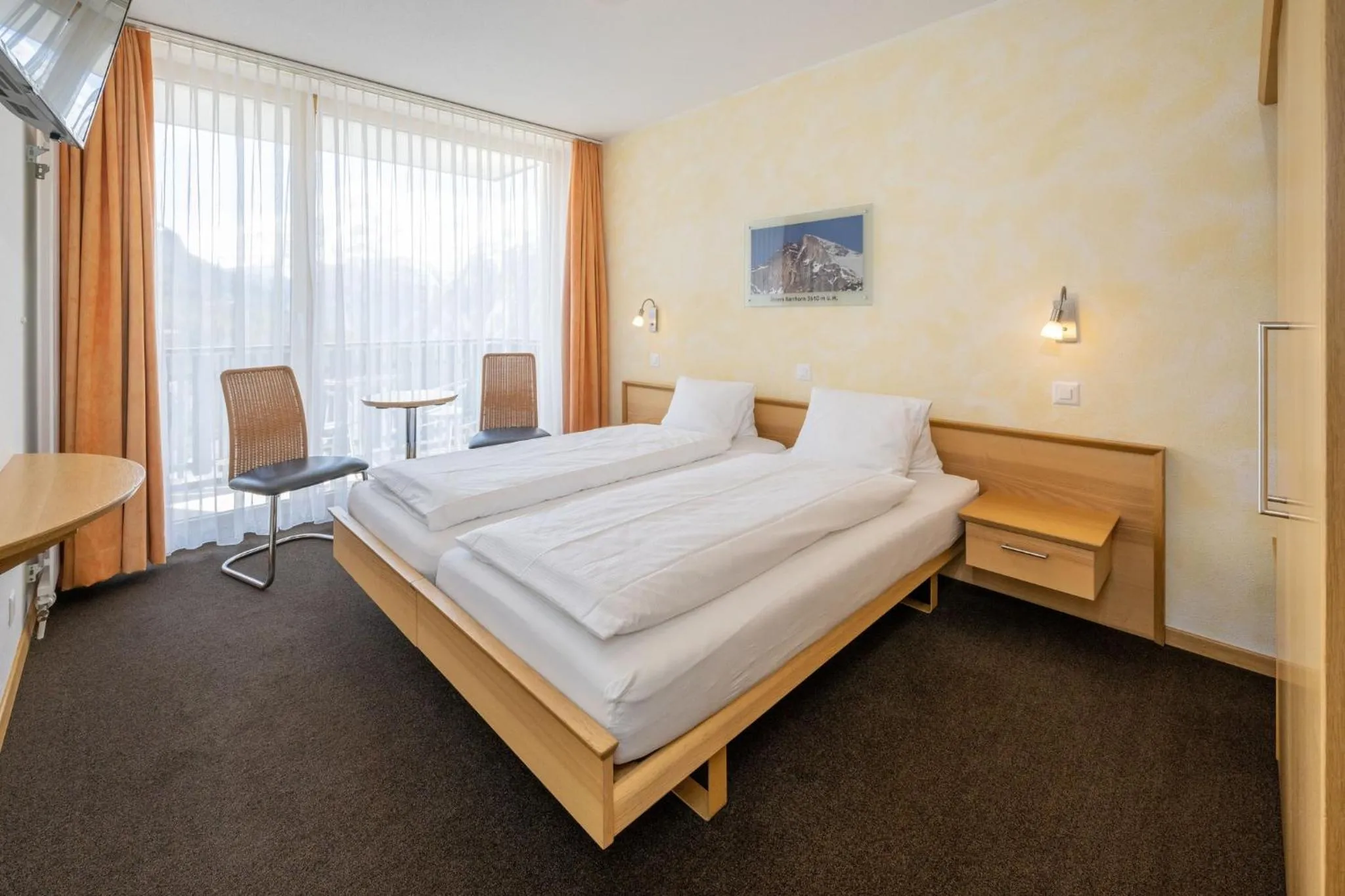 Photo of the whole room, Bed in Aktiv Hotel & Spa Hannigalp