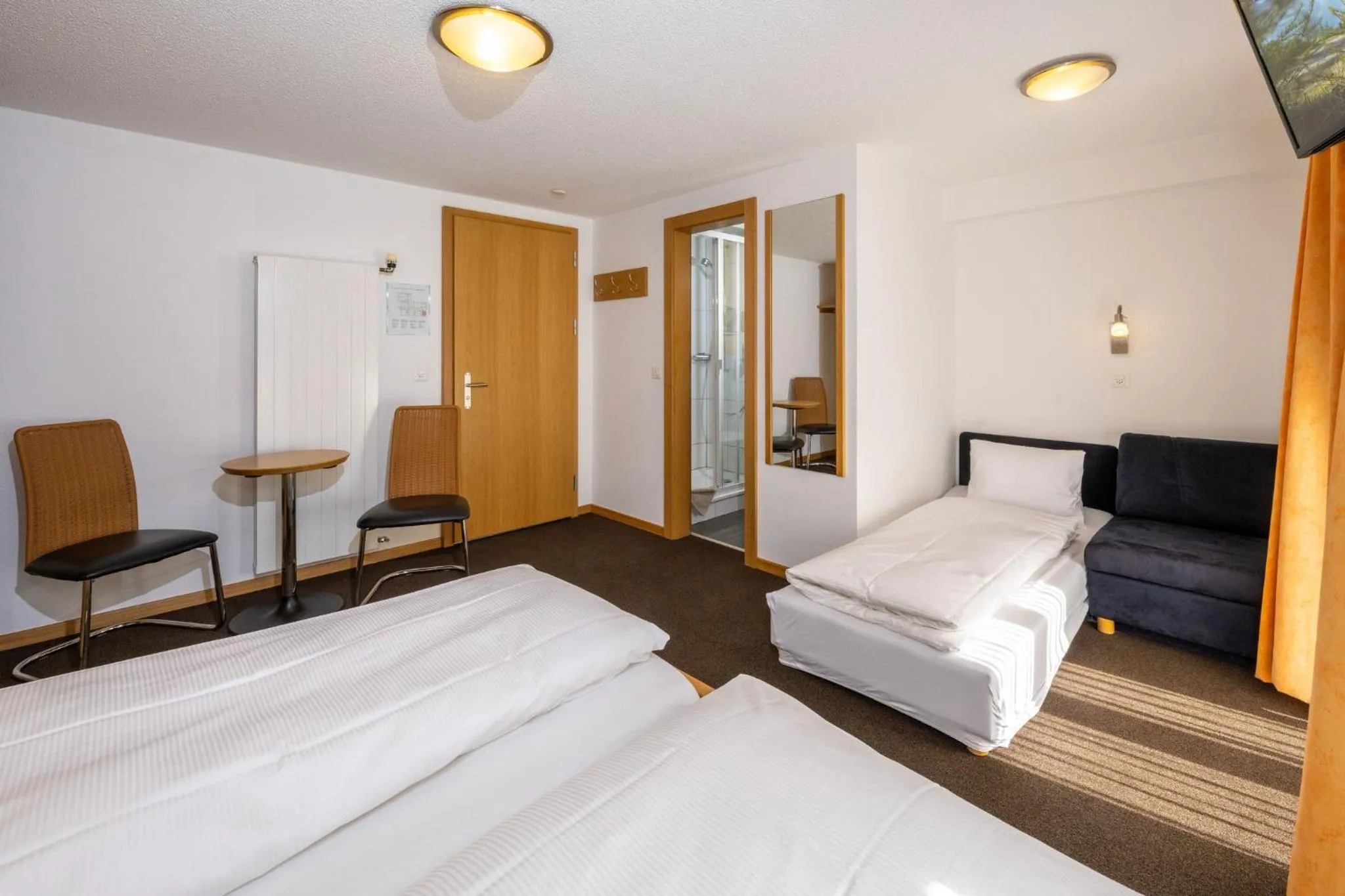 Photo of the whole room, Bed in Aktiv Hotel & Spa Hannigalp