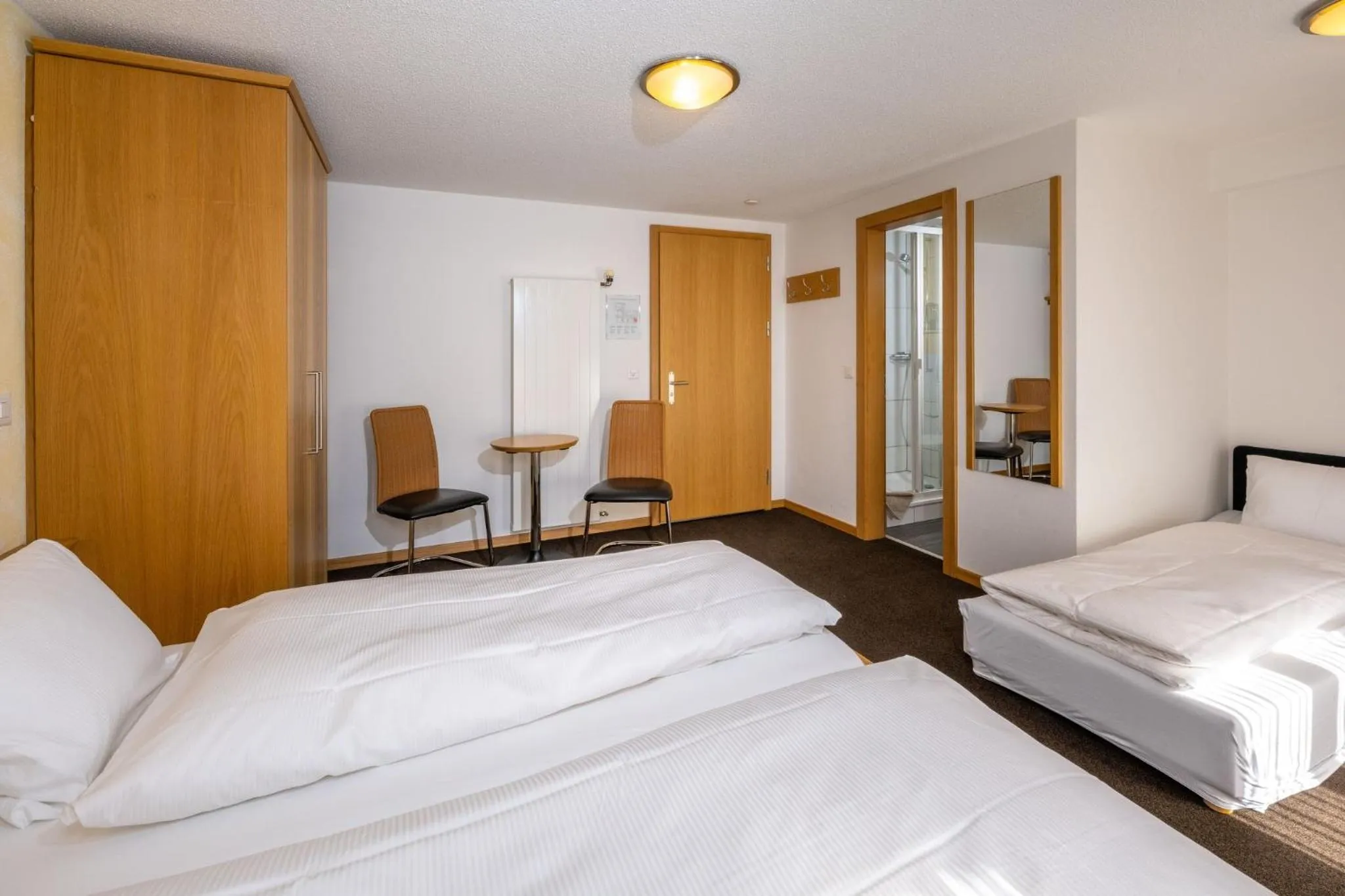 Photo of the whole room, Bed in Aktiv Hotel & Spa Hannigalp