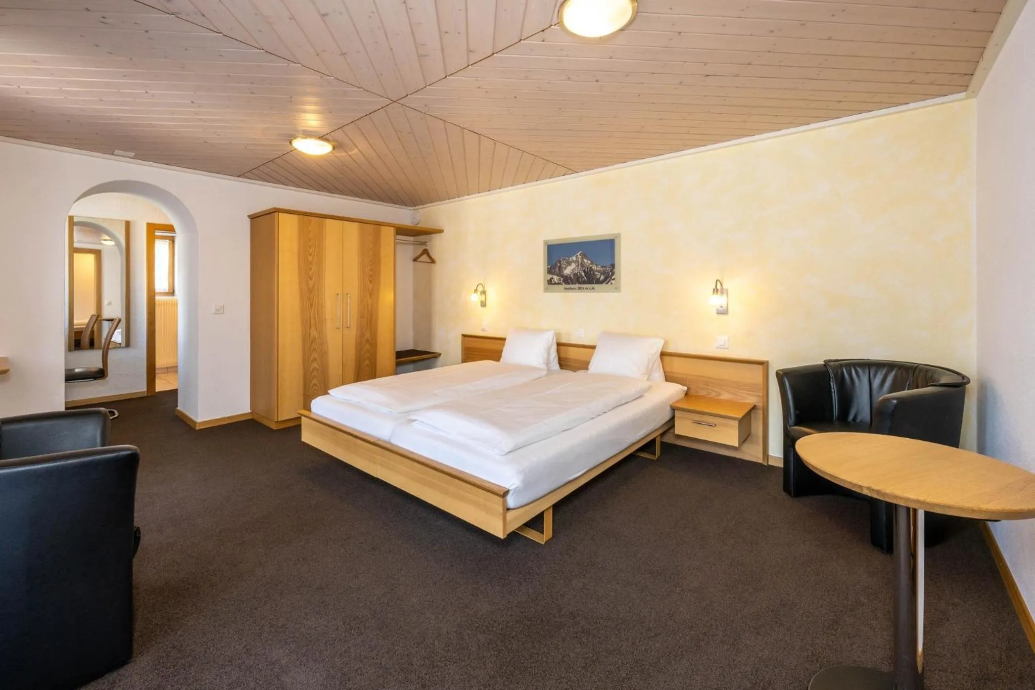 Photo of the whole room, Bed in Aktiv Hotel & Spa Hannigalp