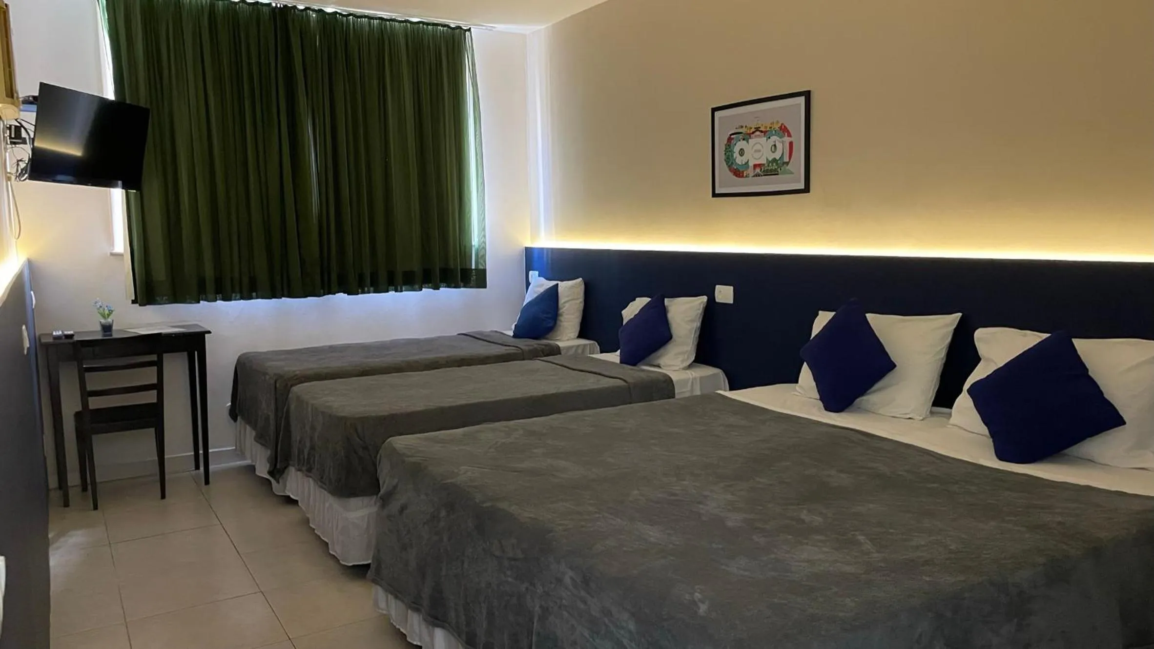 Bed in Copacabana Blue Hotel