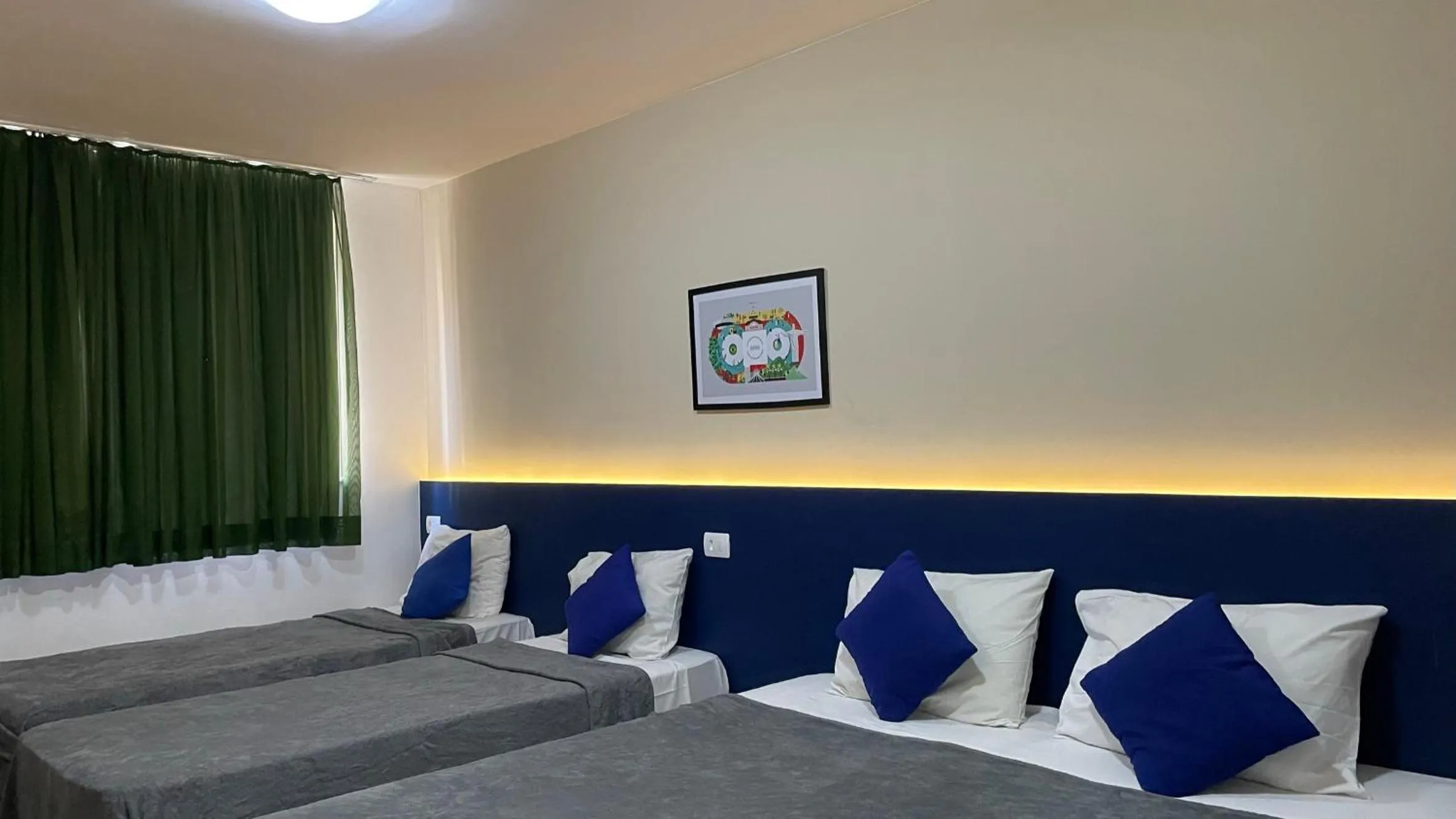 Bed in Copacabana Blue Hotel