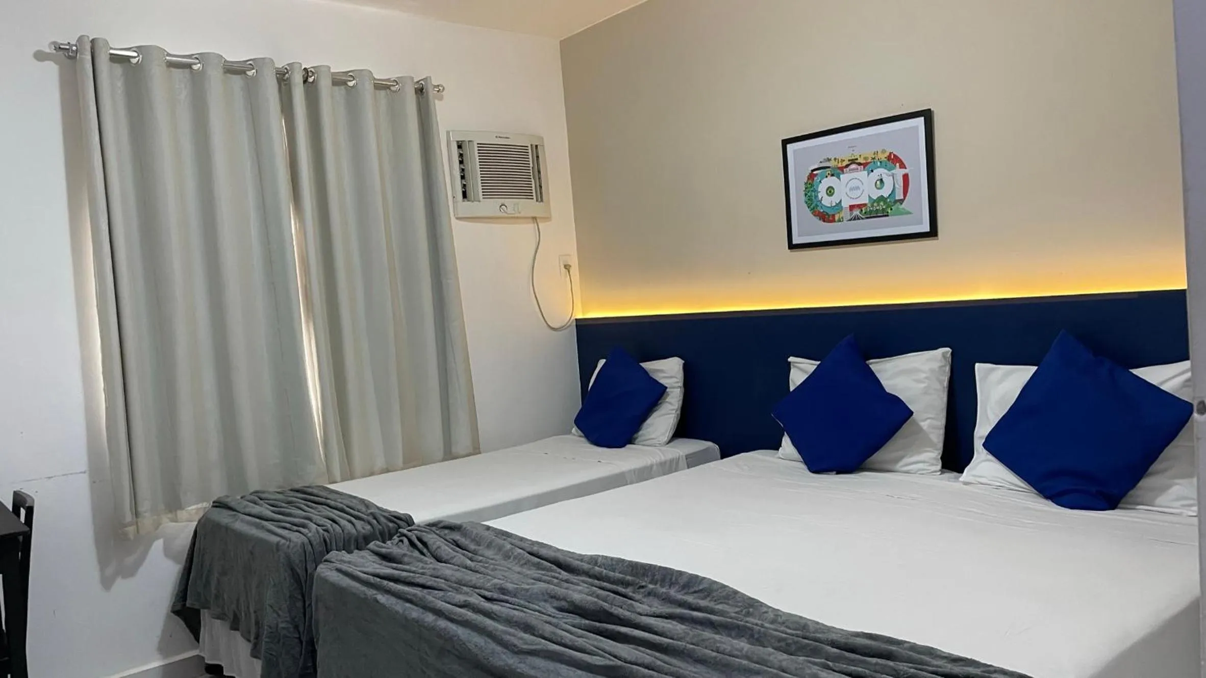 Bed in Copacabana Blue Hotel