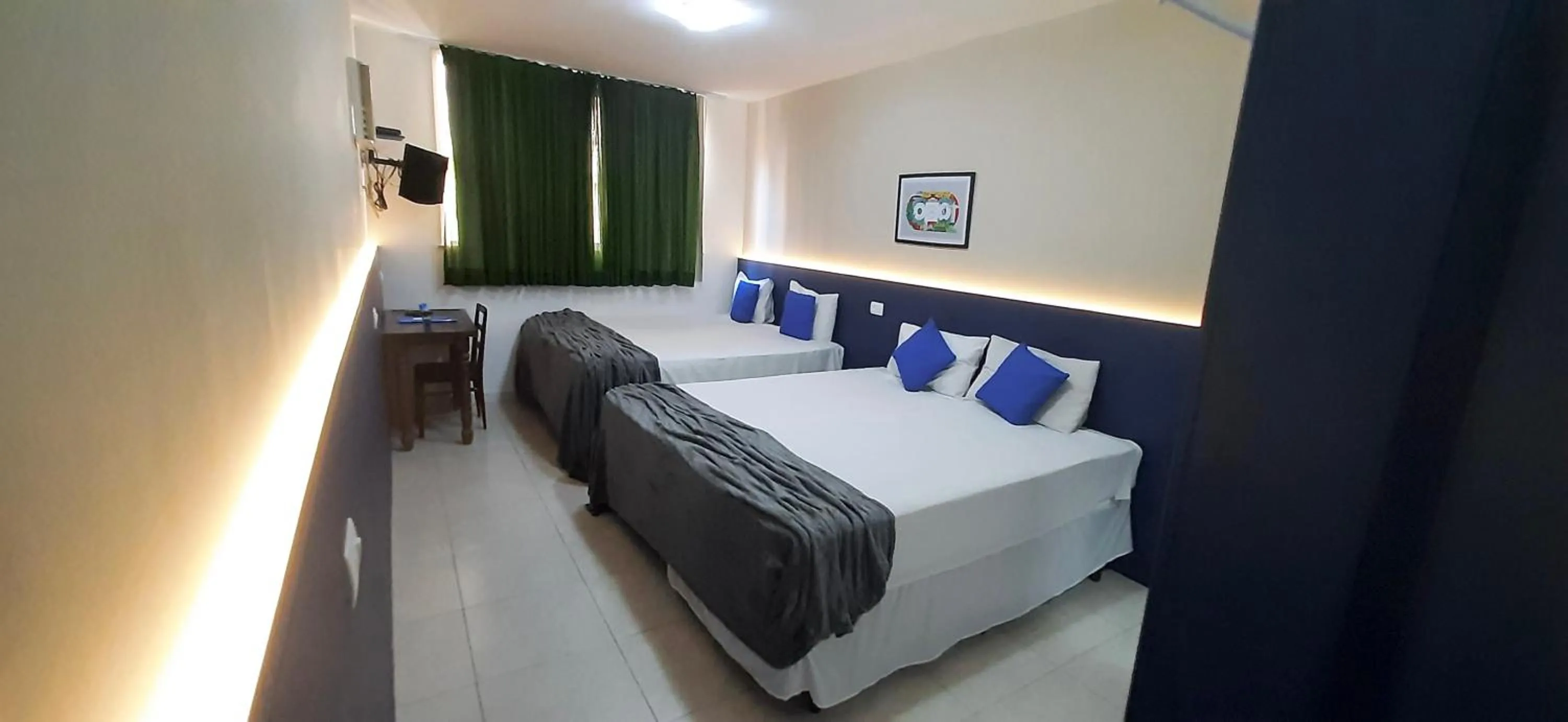 Bed in Copacabana Blue Hotel