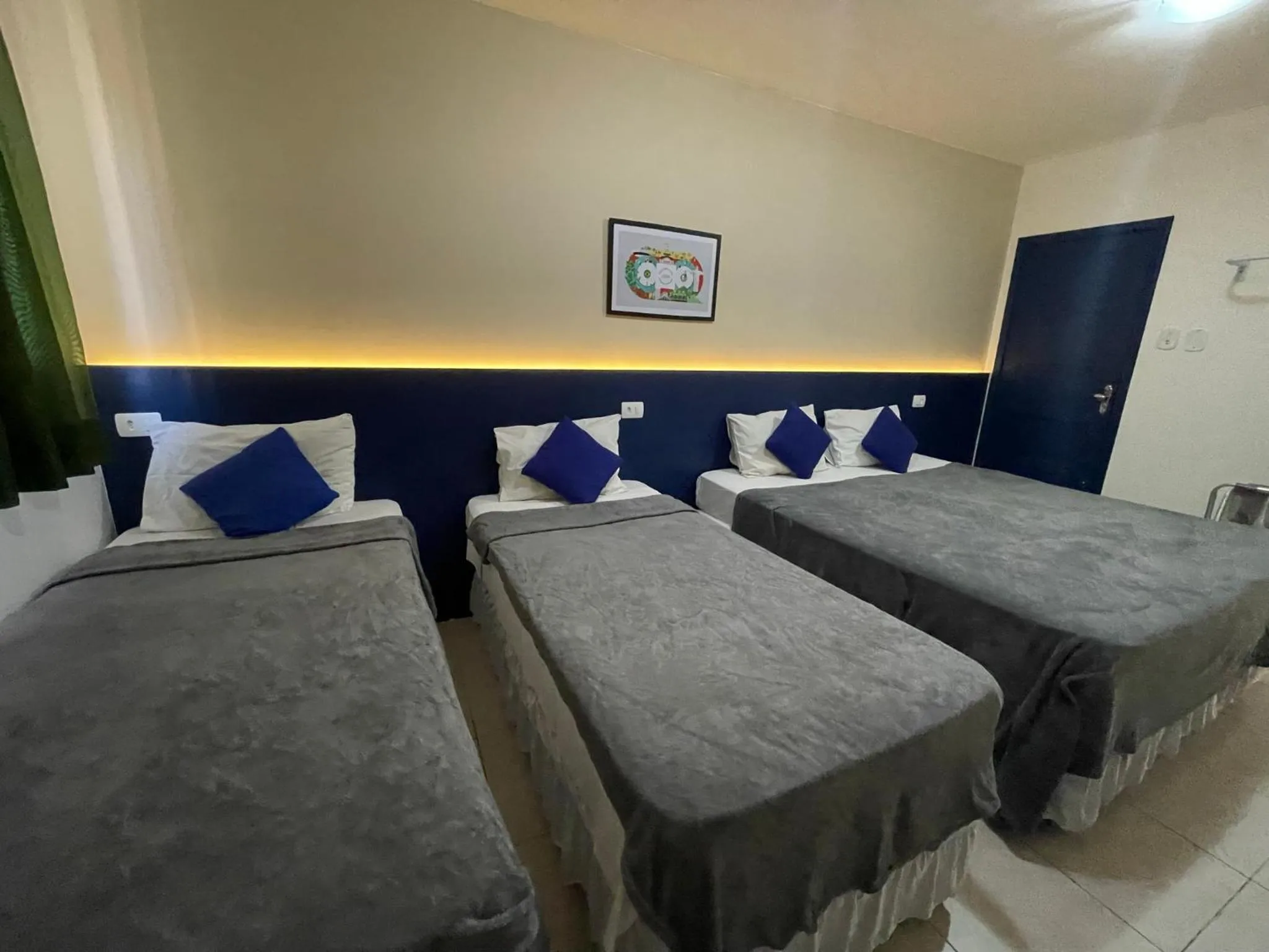 Bed in Copacabana Blue Hotel