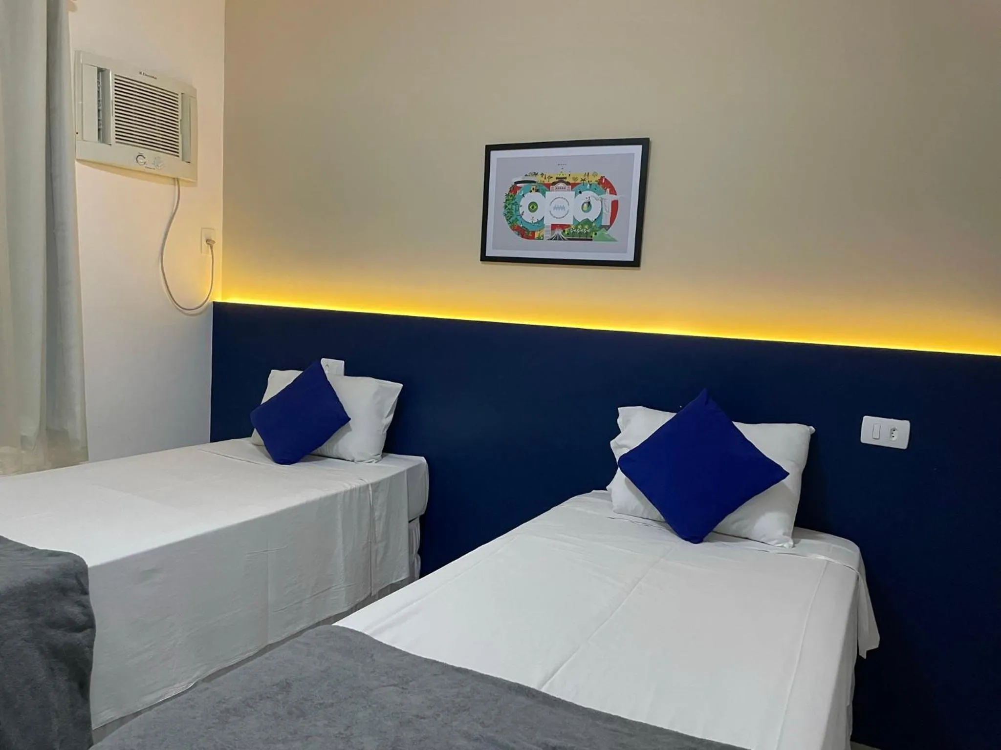 Bed in Copacabana Blue Hotel