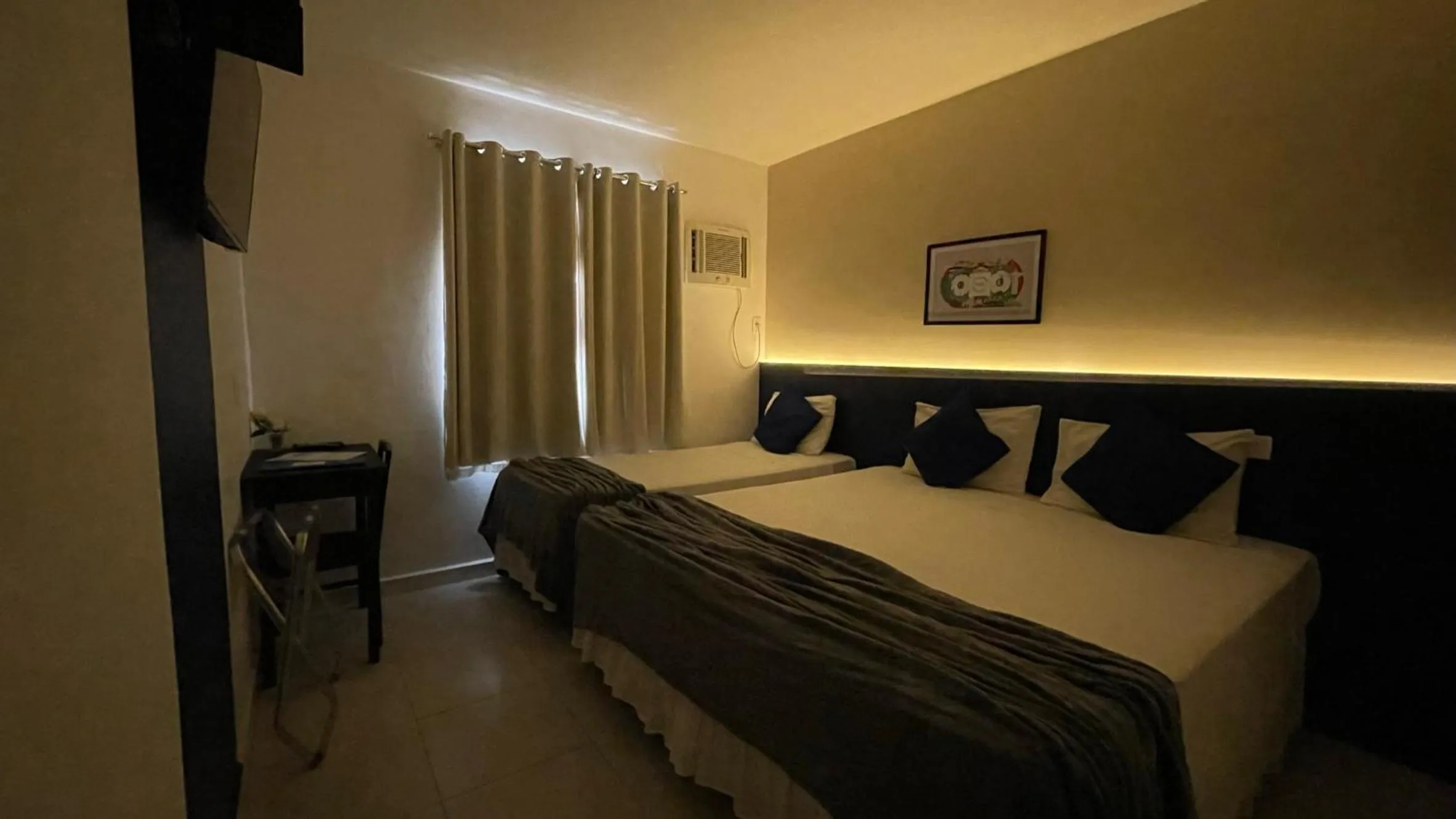 Bed in Copacabana Blue Hotel