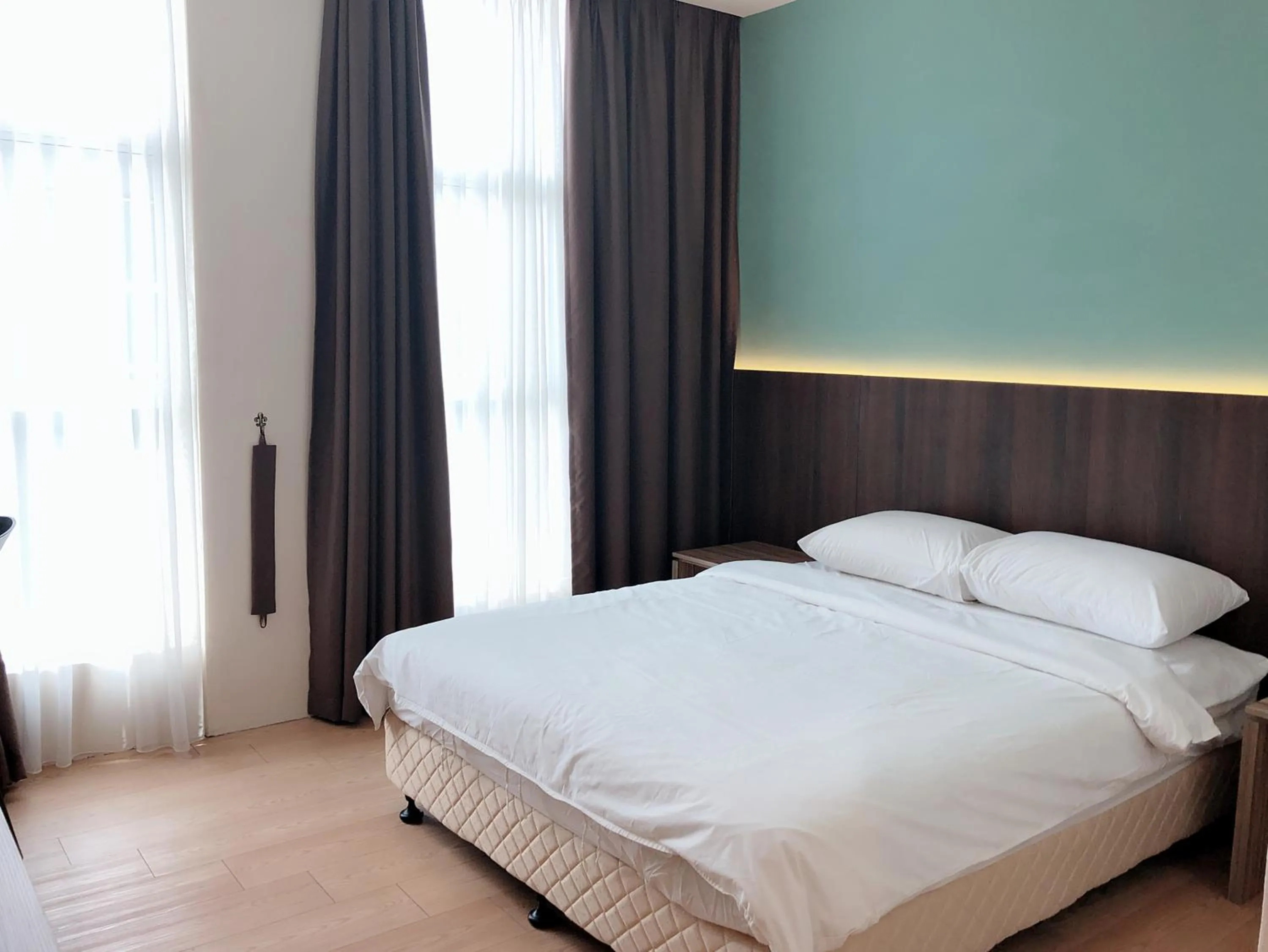 Bed in Tumike Hotel Bentong