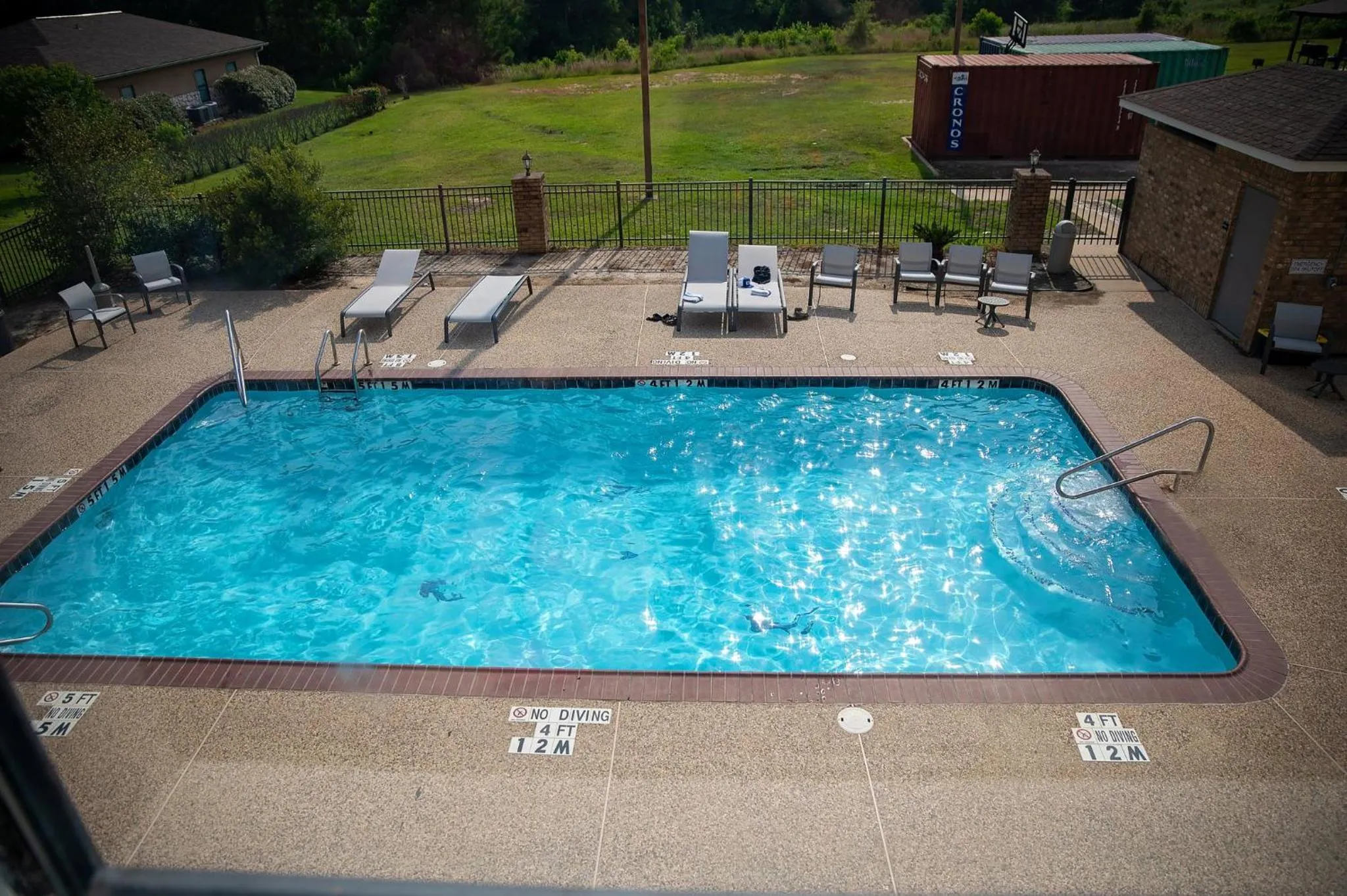 Swimming pool in Holiday Inn Express Hotel & Suites Center by IHG